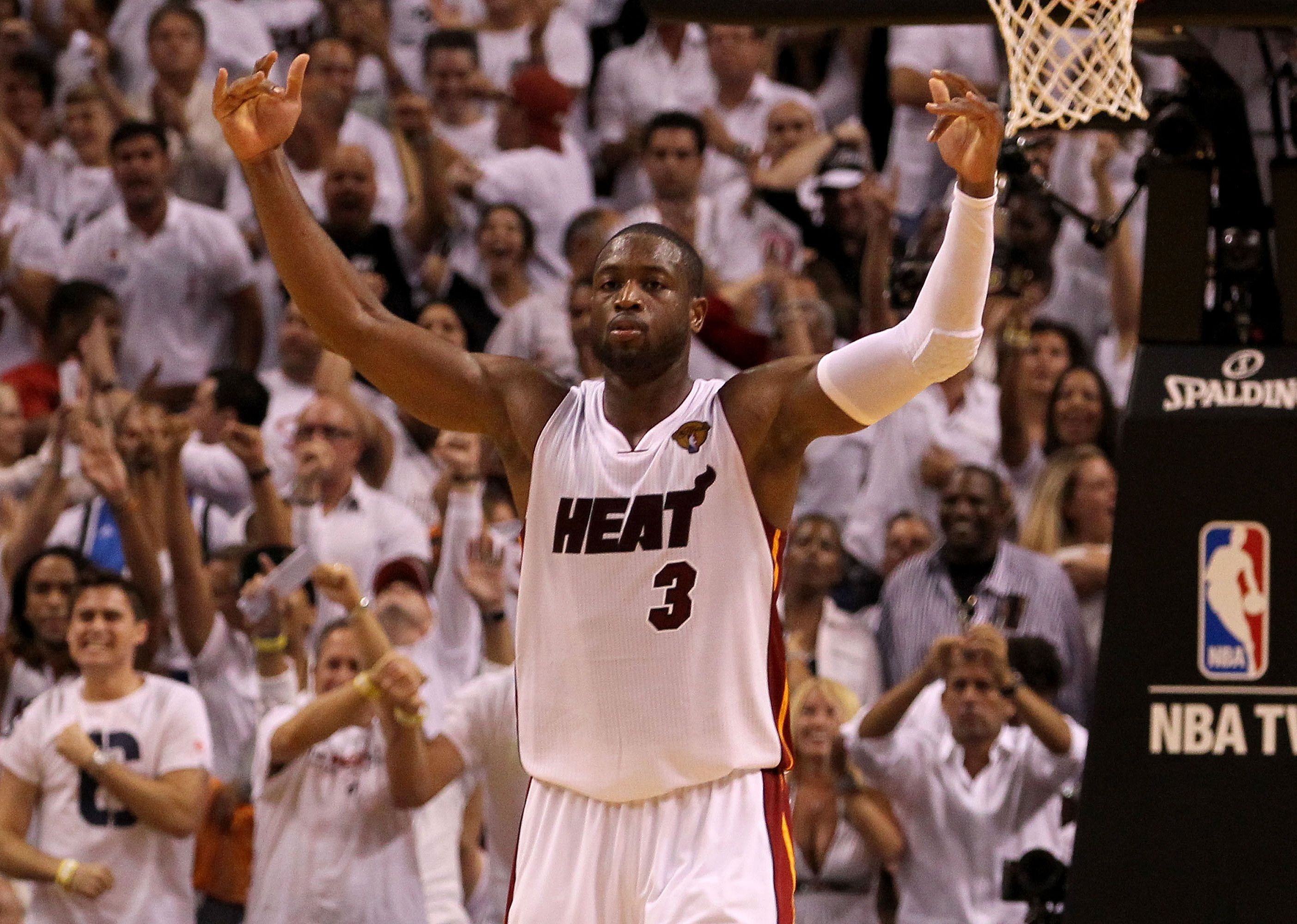 Dwyane Wade celebrates on the court