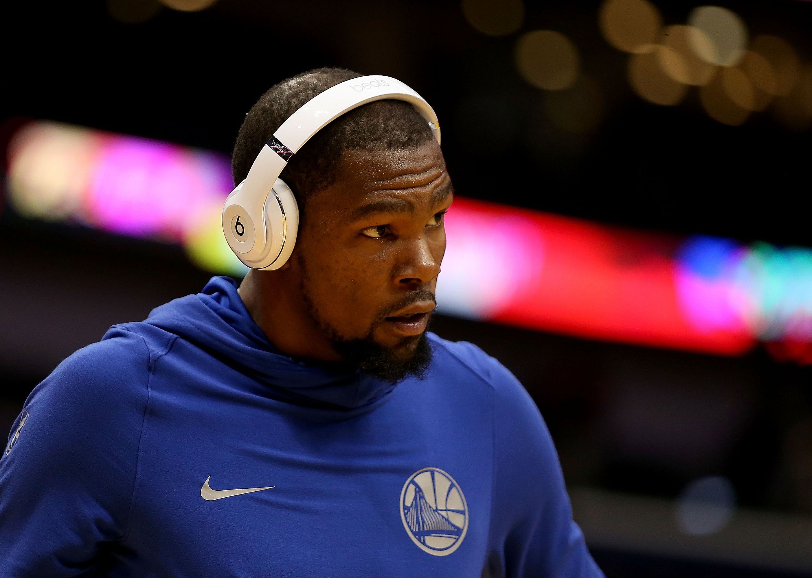 Kevin Durant of the Golden State Warriors wears a pair of Beats headphones.