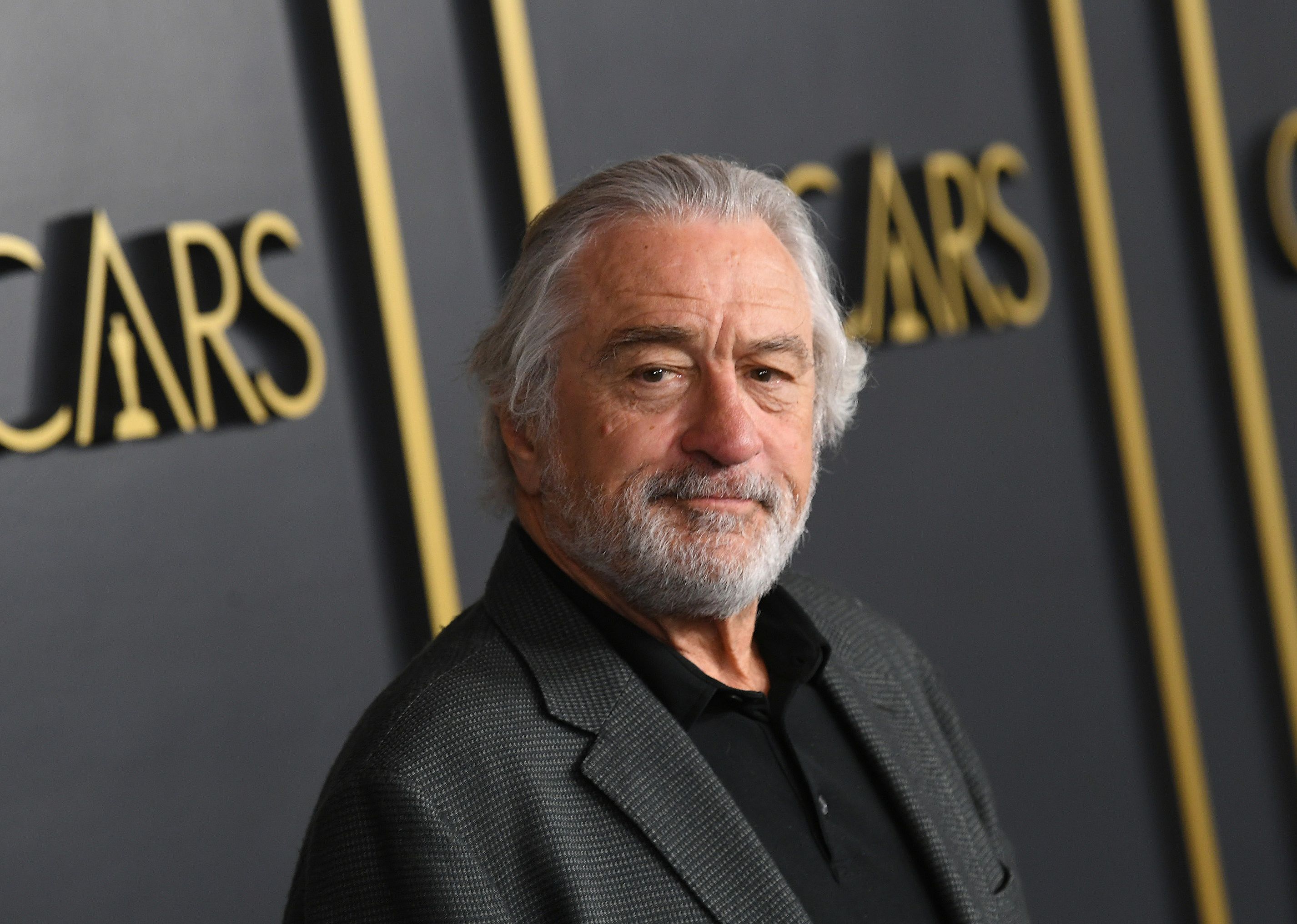 Robert De Niro in black.