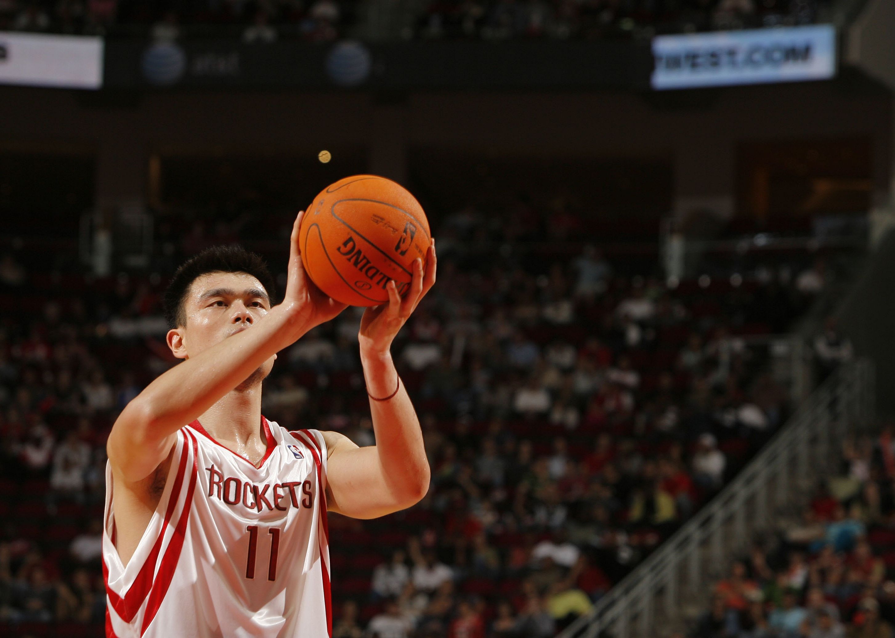 Yao Ming shoots the basketball during a game.