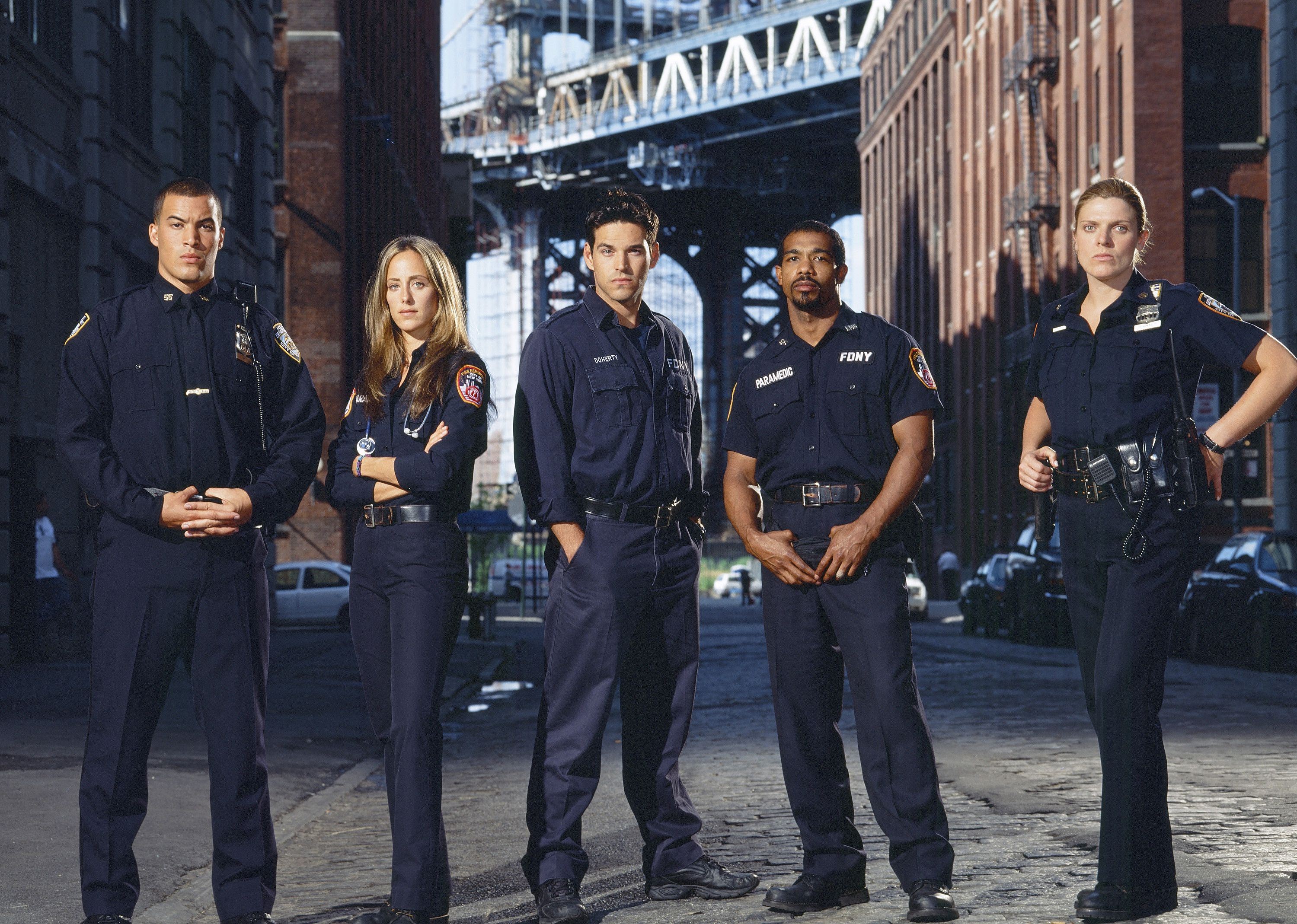 First responders from Third Watch standing on a New York street.