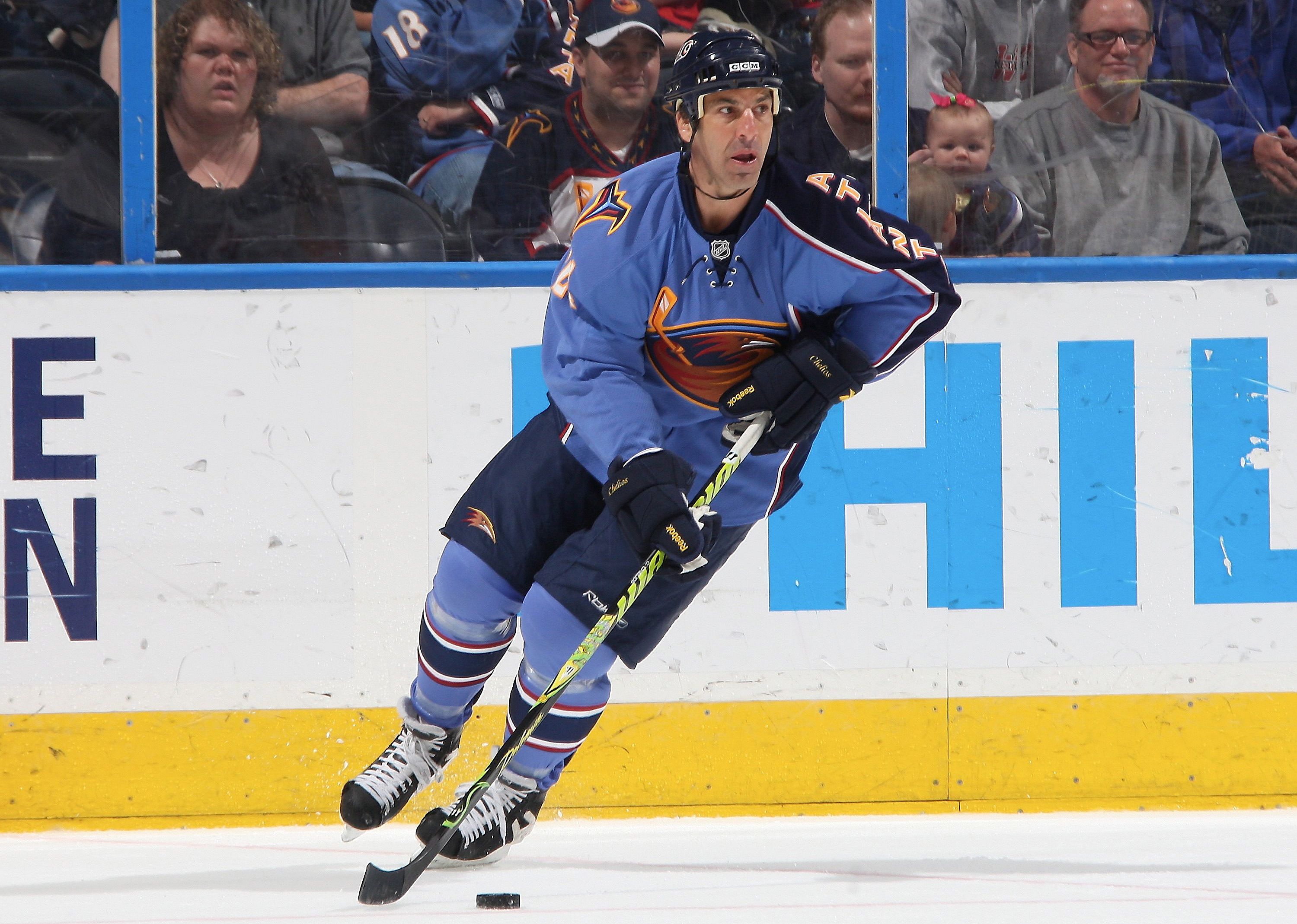 Chris Chelios carries the puck against the New Jersey Devils