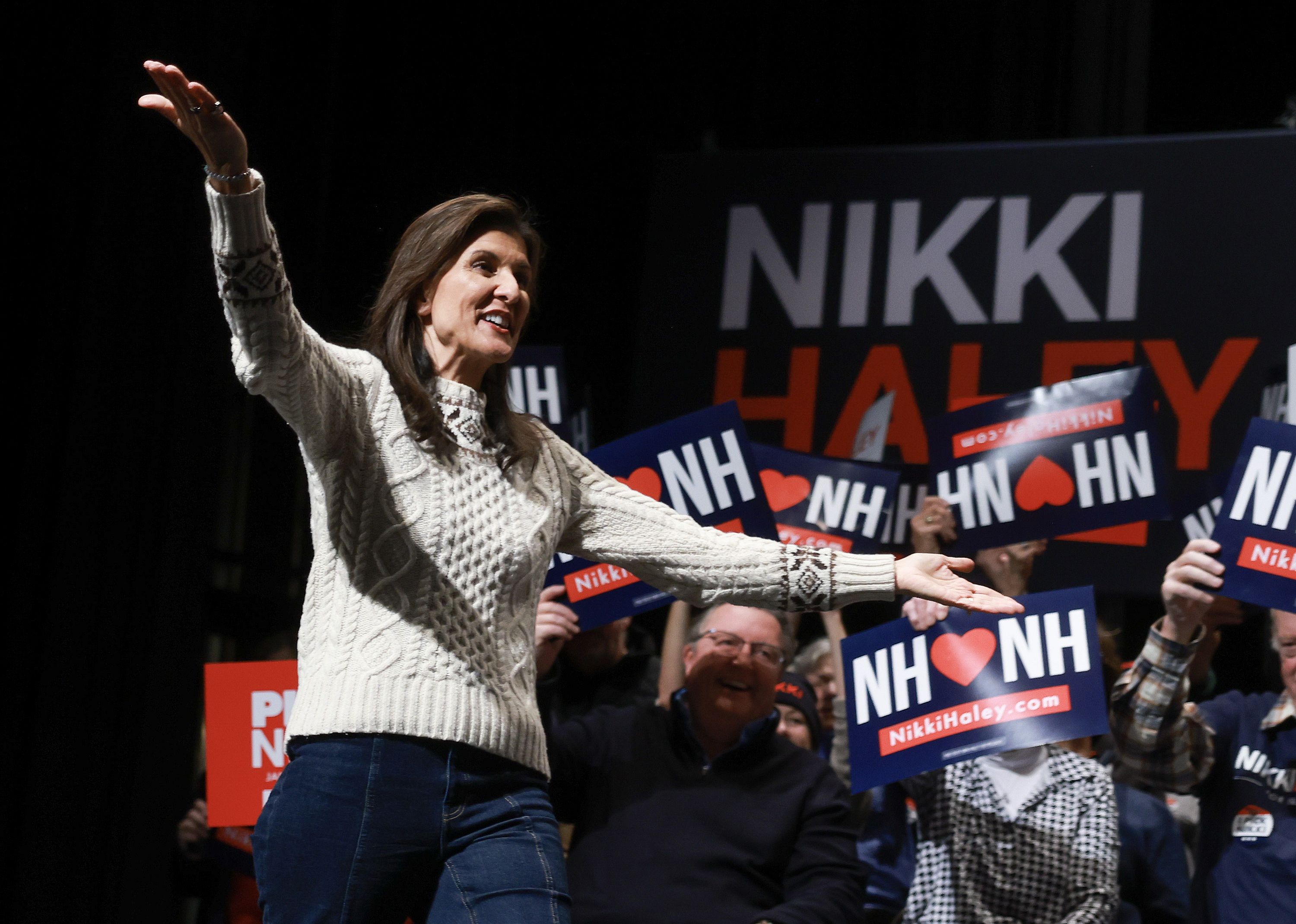 Nikki Haley arrives on stage during a campaign event at Exeter High School in Newmarket, New Hampshire. 