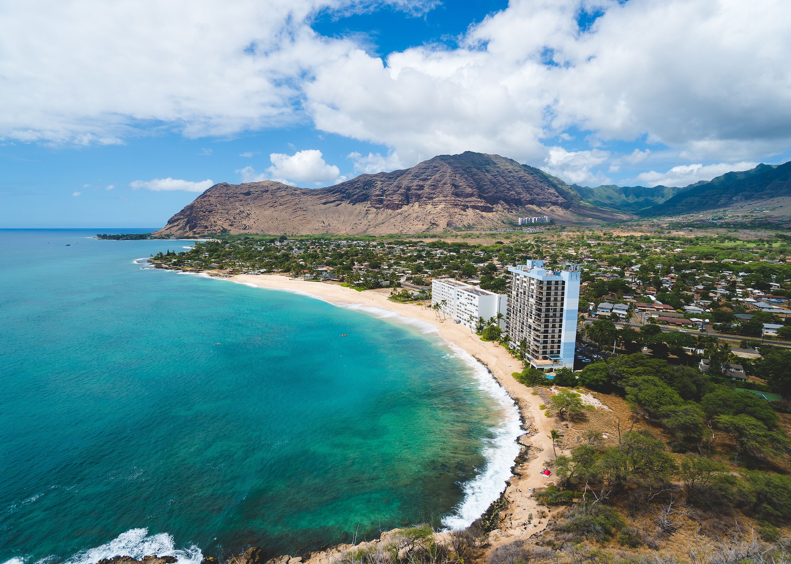 Aerial of the mountains and skies around Makaha.
