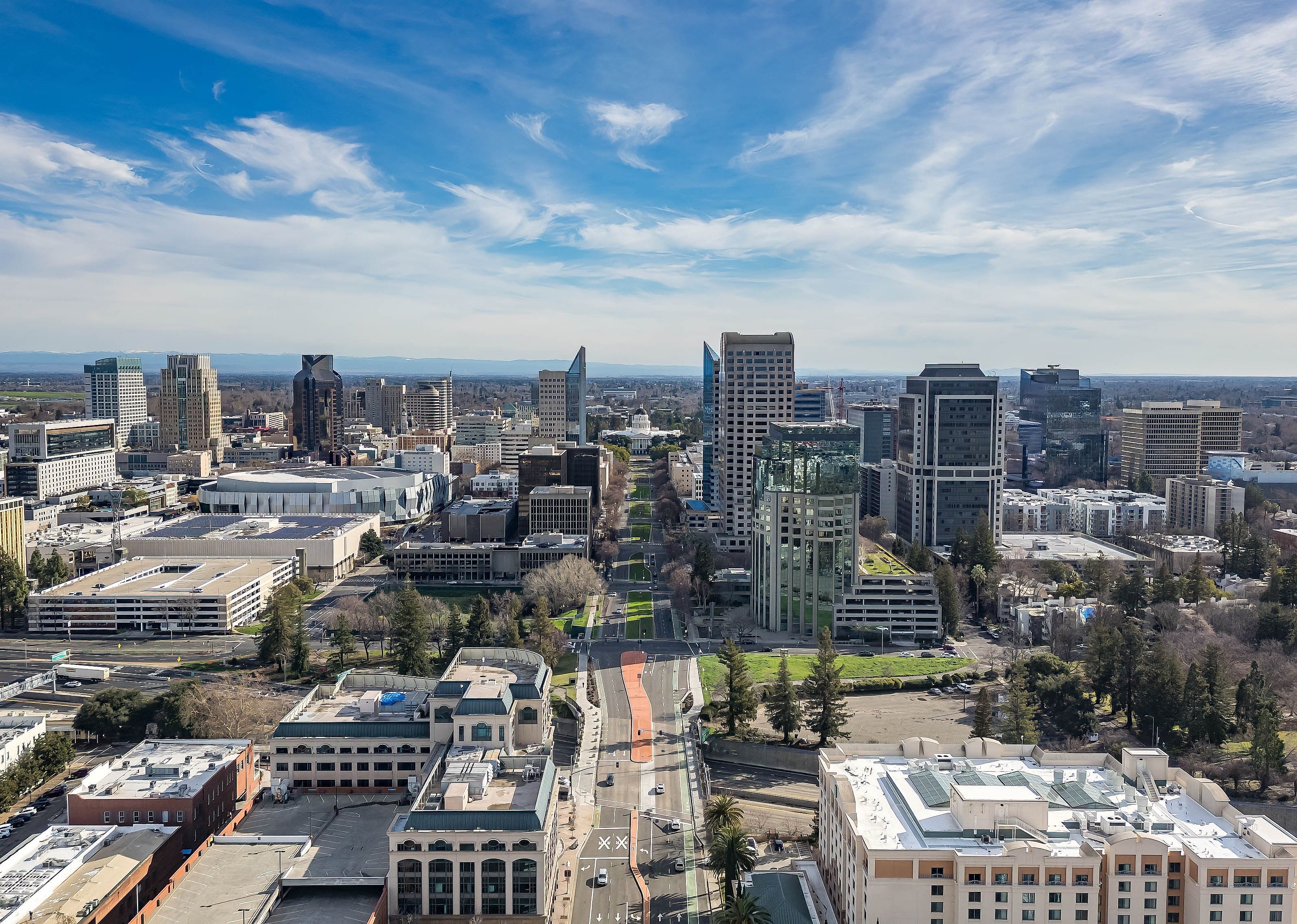 A city scape including the Tower Bridge and State Capitol Building in Sacramento.