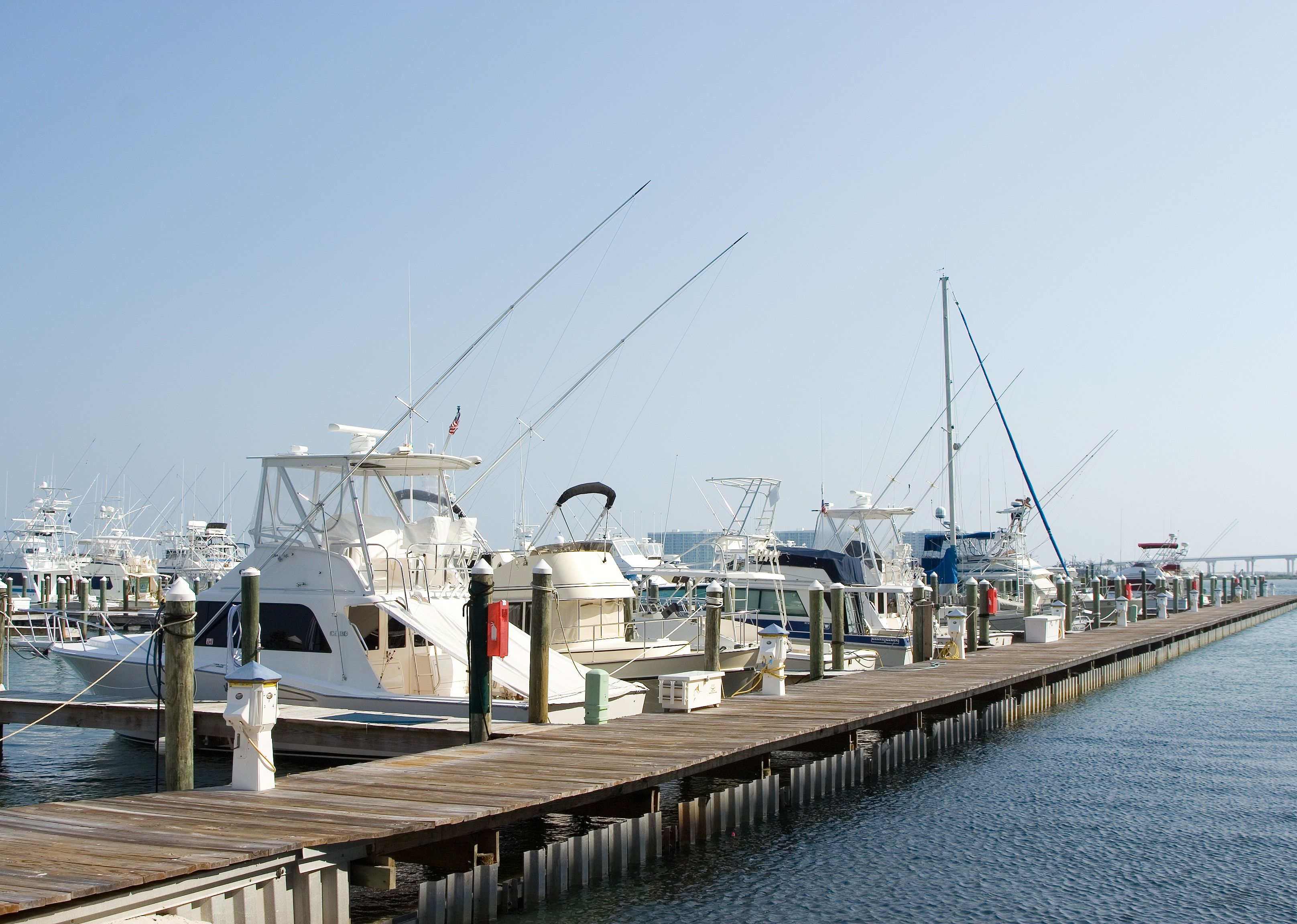 Boats sitting in a marina.