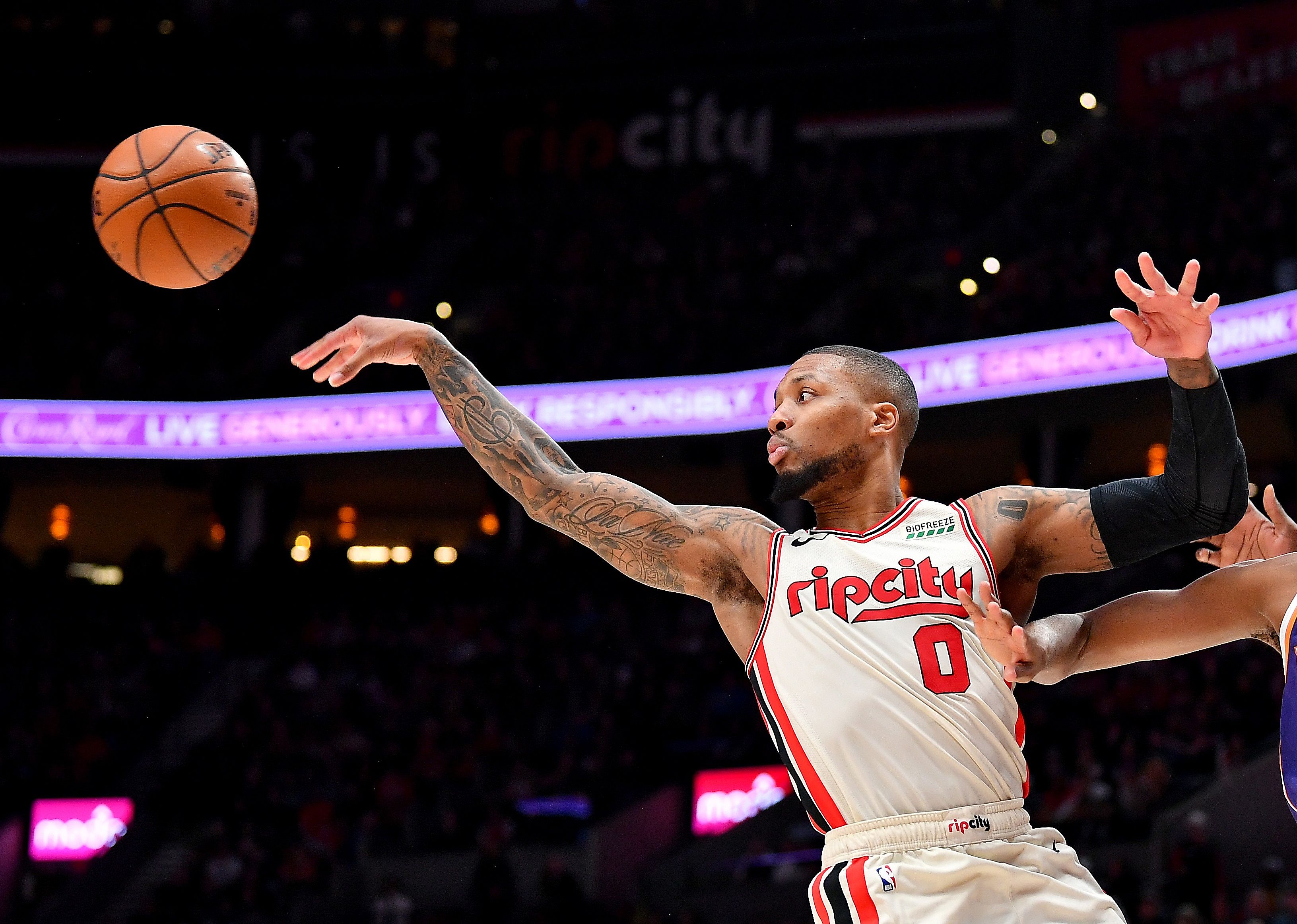 Damian Lillard #0 of the Portland Trail Blazers passes the ball.