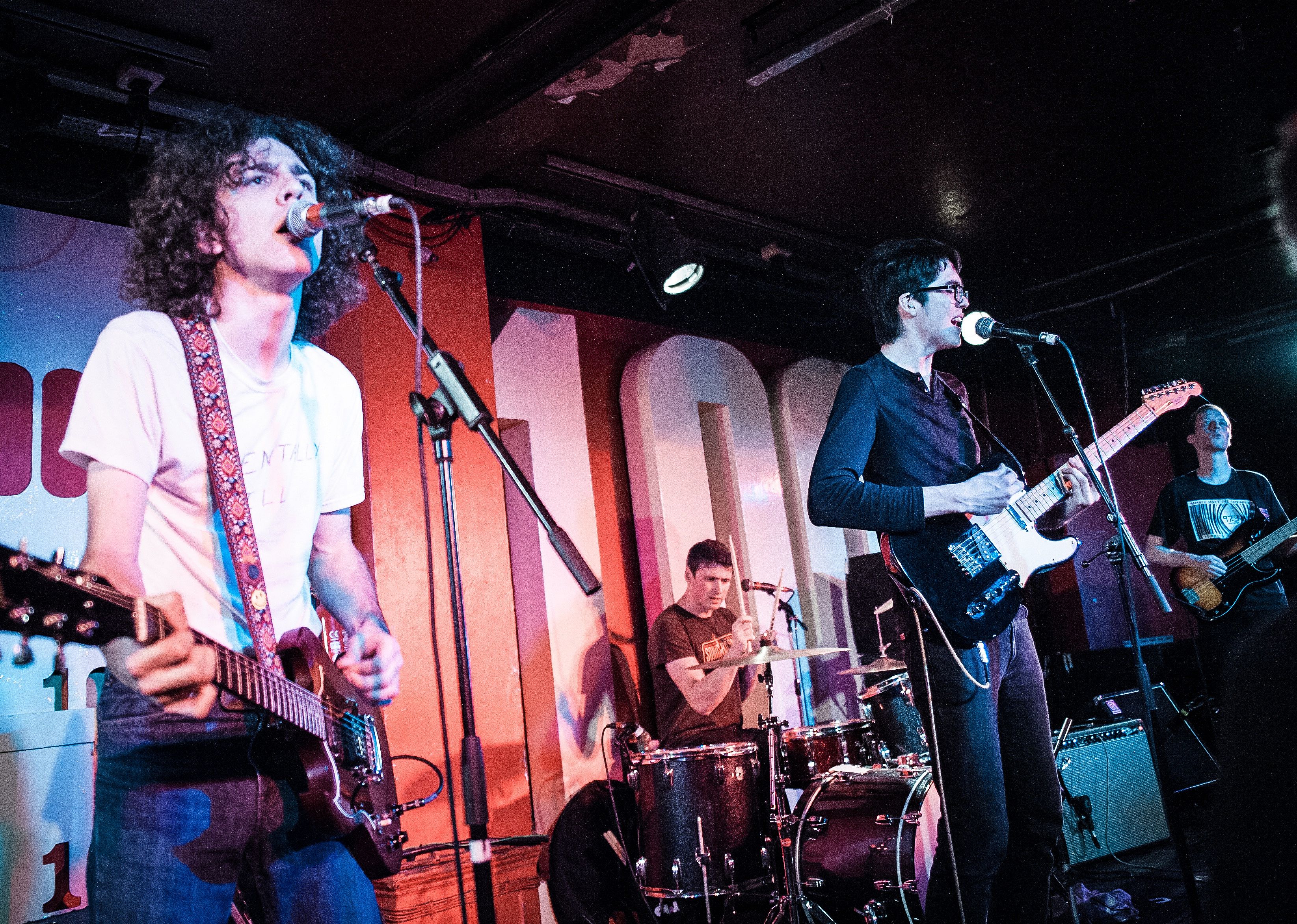 Car Seat Headrest sing a song onstage