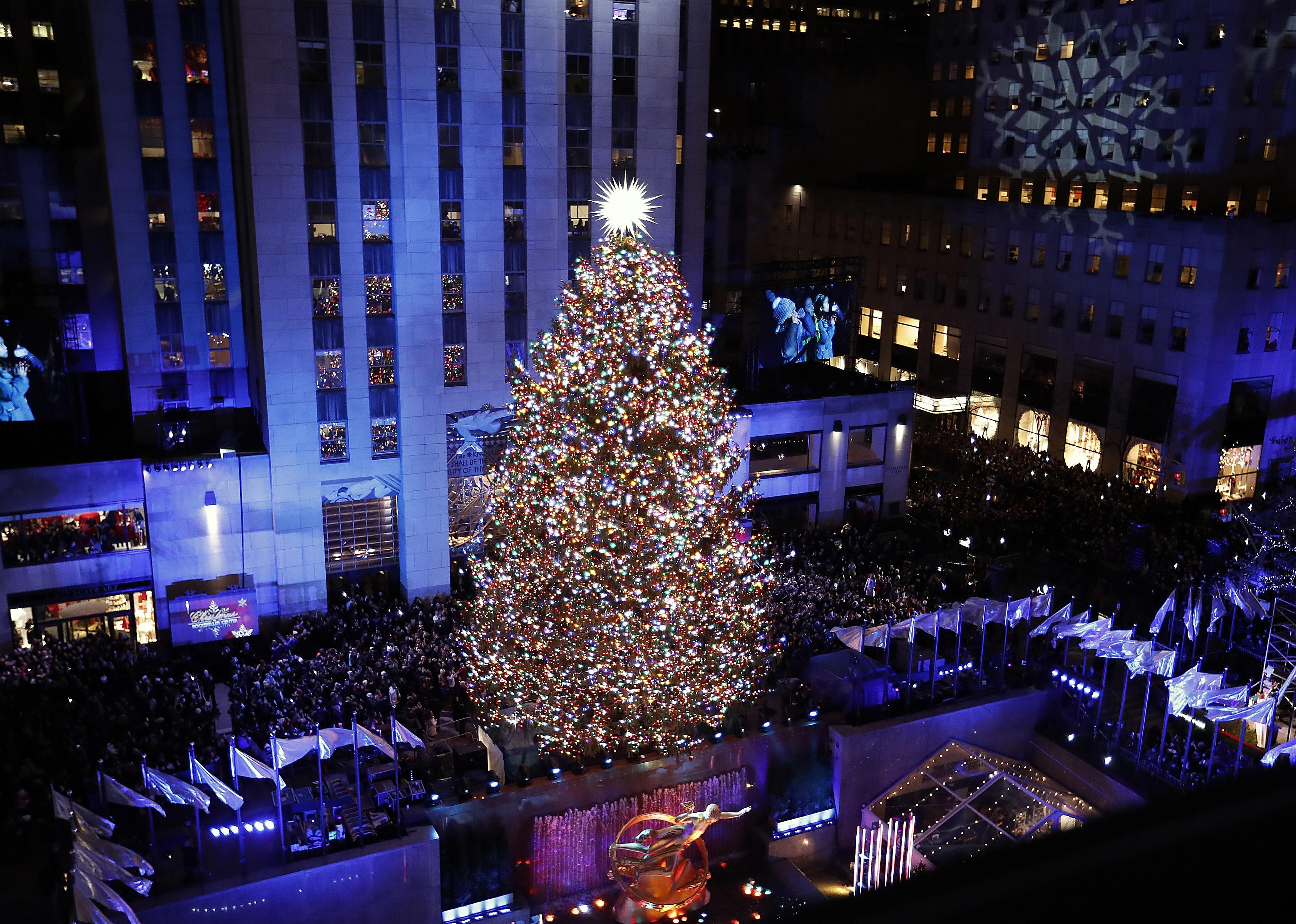 Elevated view of Rockefeller Center Christmas Tree at night.