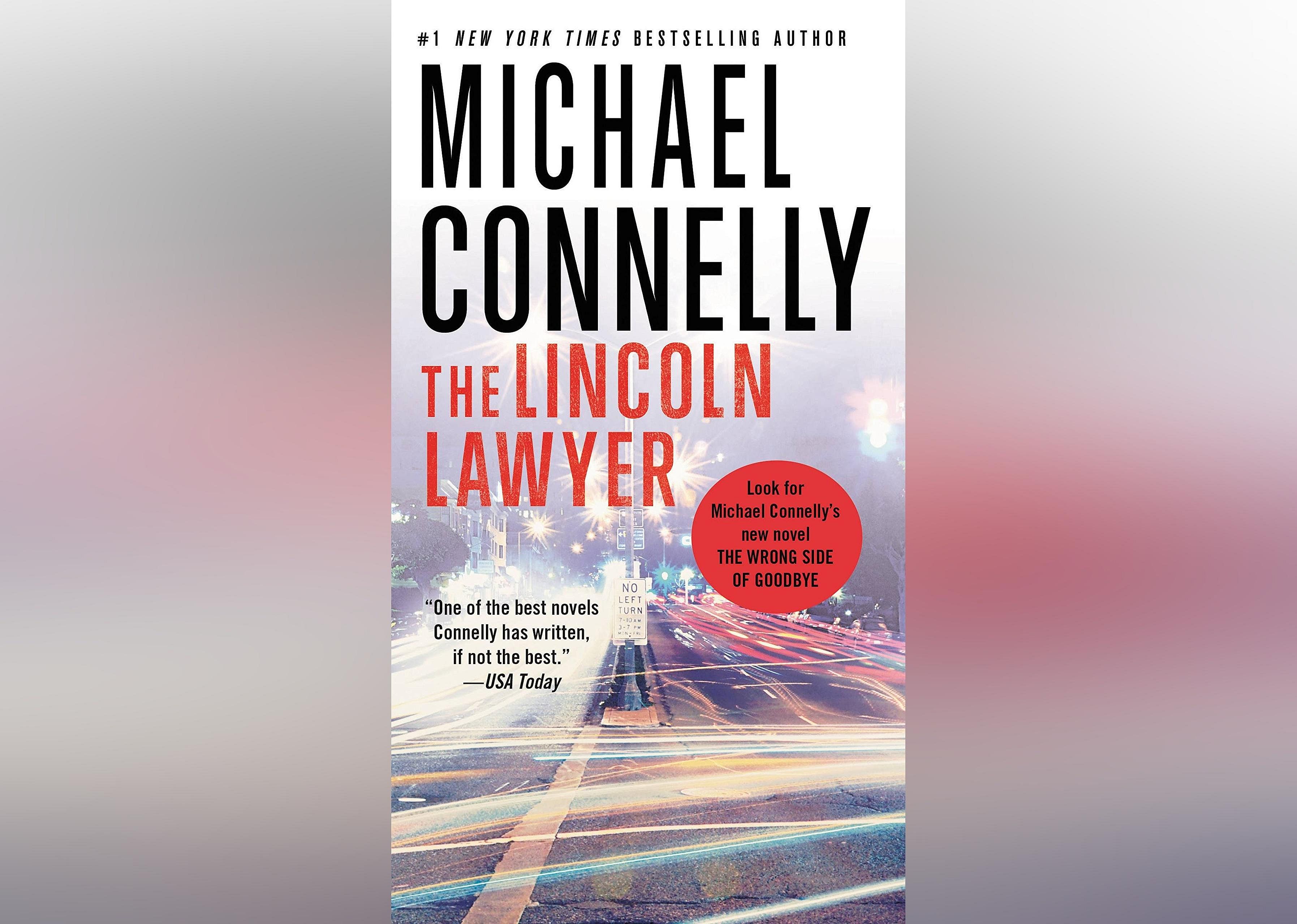 The cover, which has a colorful illustration of a city street lit up by streetlights. 
