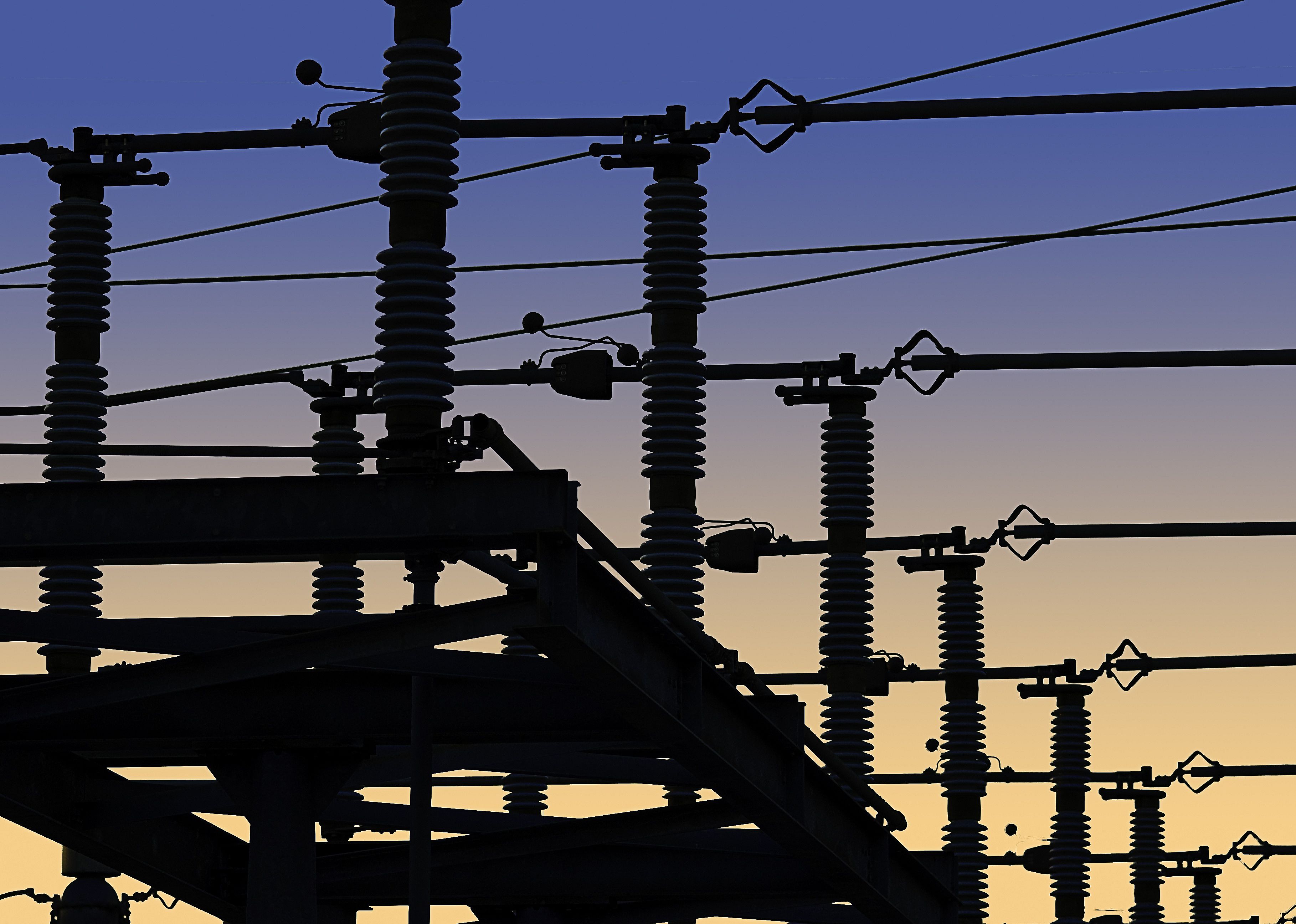 Electrical power grid in silhouette.