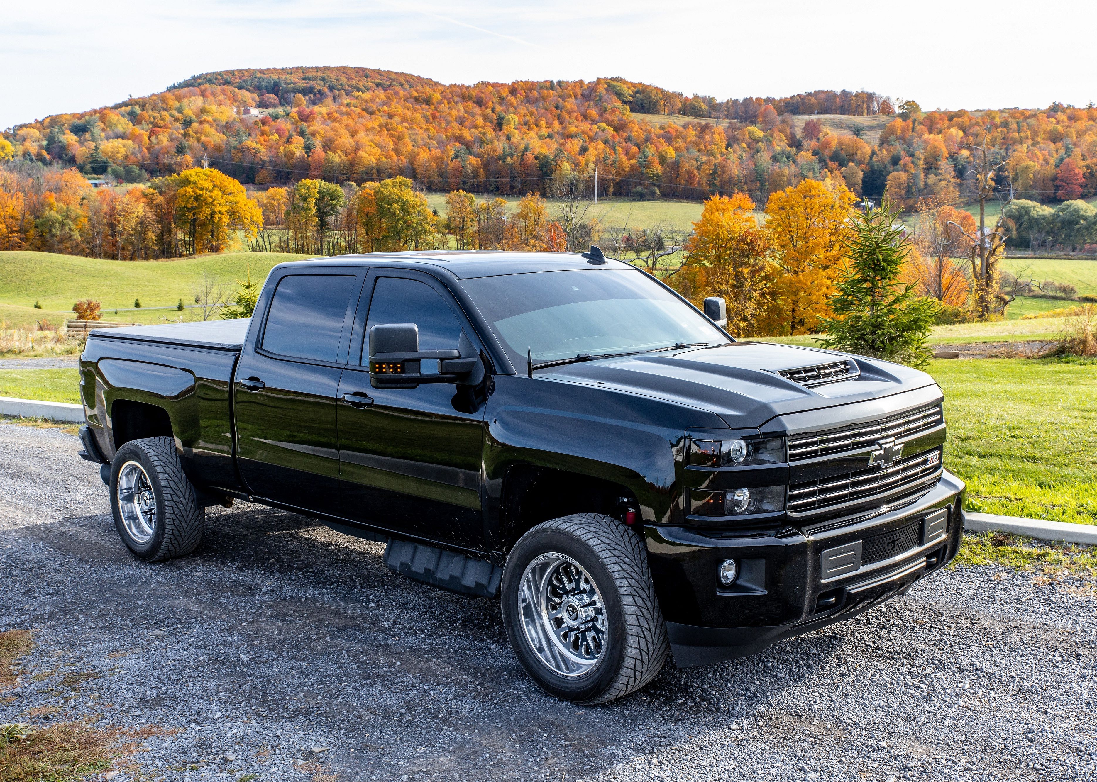  A black Chevrolet Silverado pickup truck.