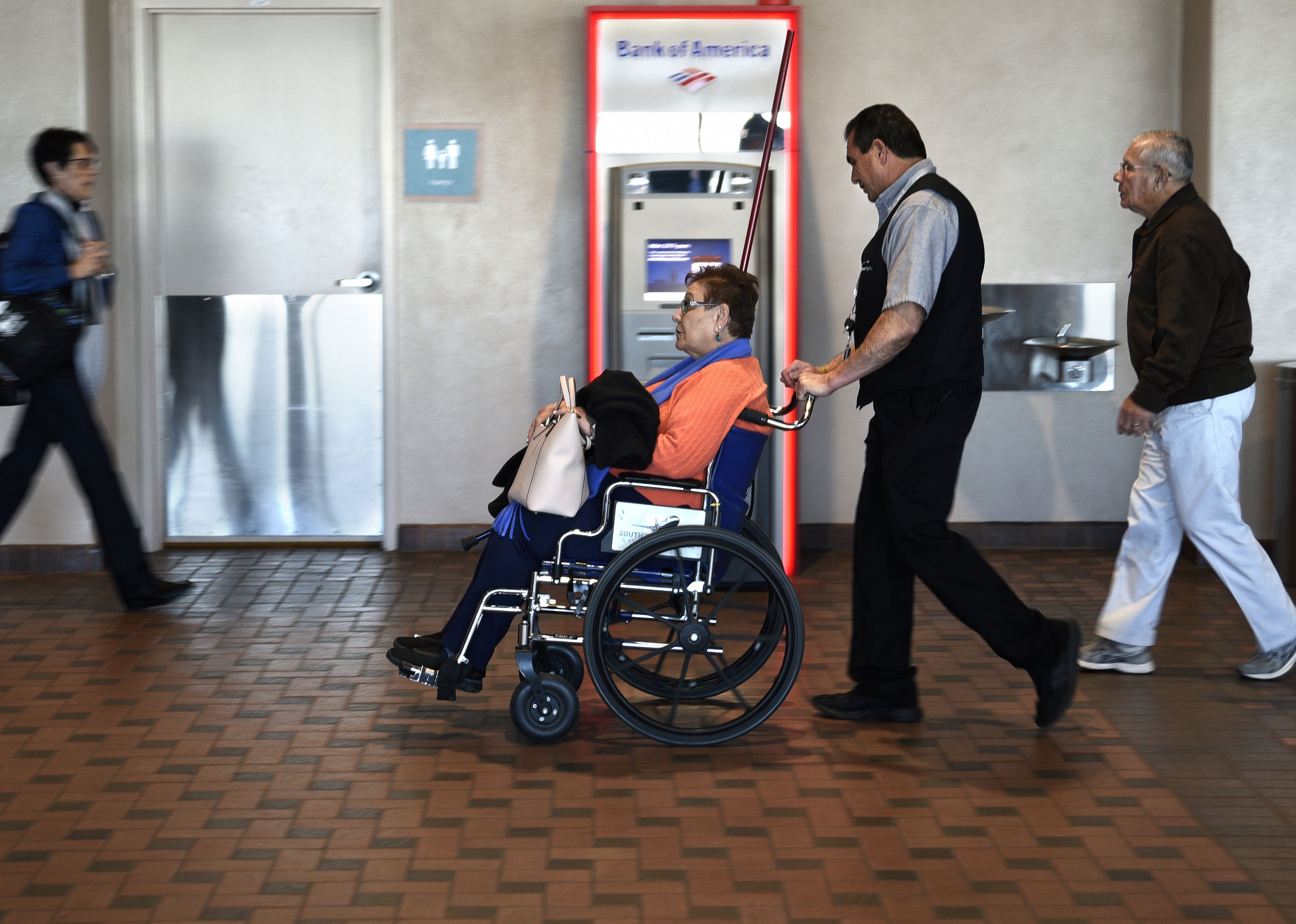 Southwest Airlines passenger pushed through a terminal