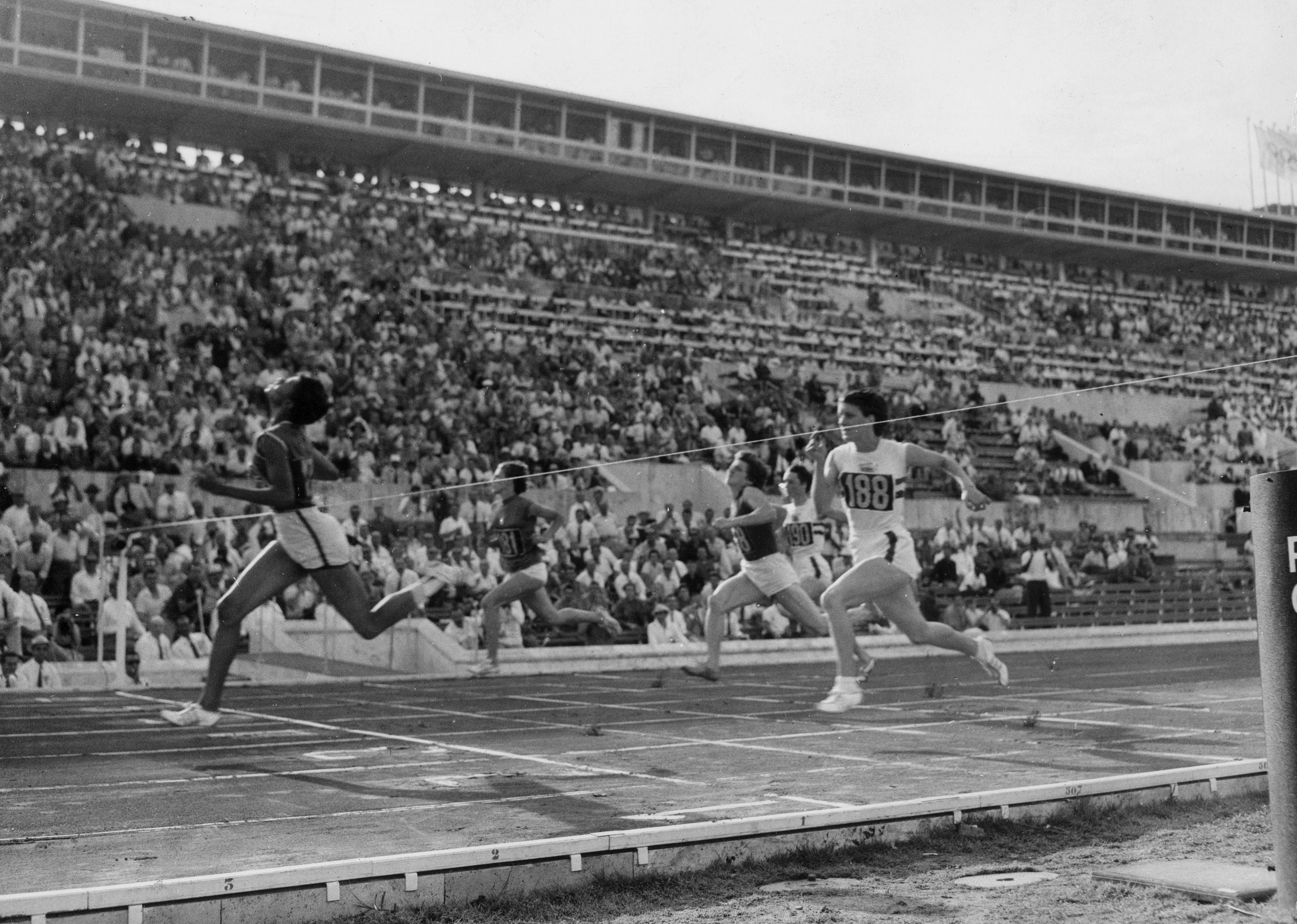 1960: Wilma Rudolph first American to win three golds in single Olympics