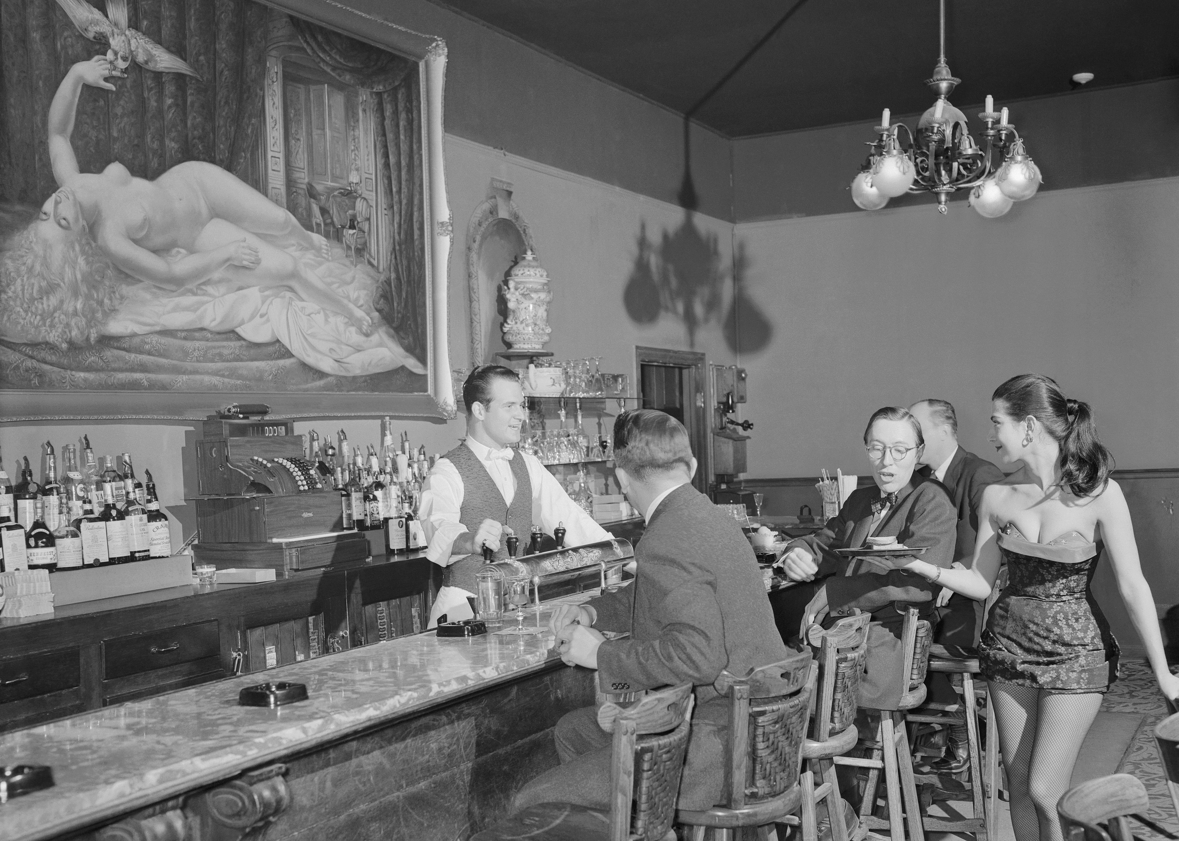Waitress serving drinks at the GasLight Club
