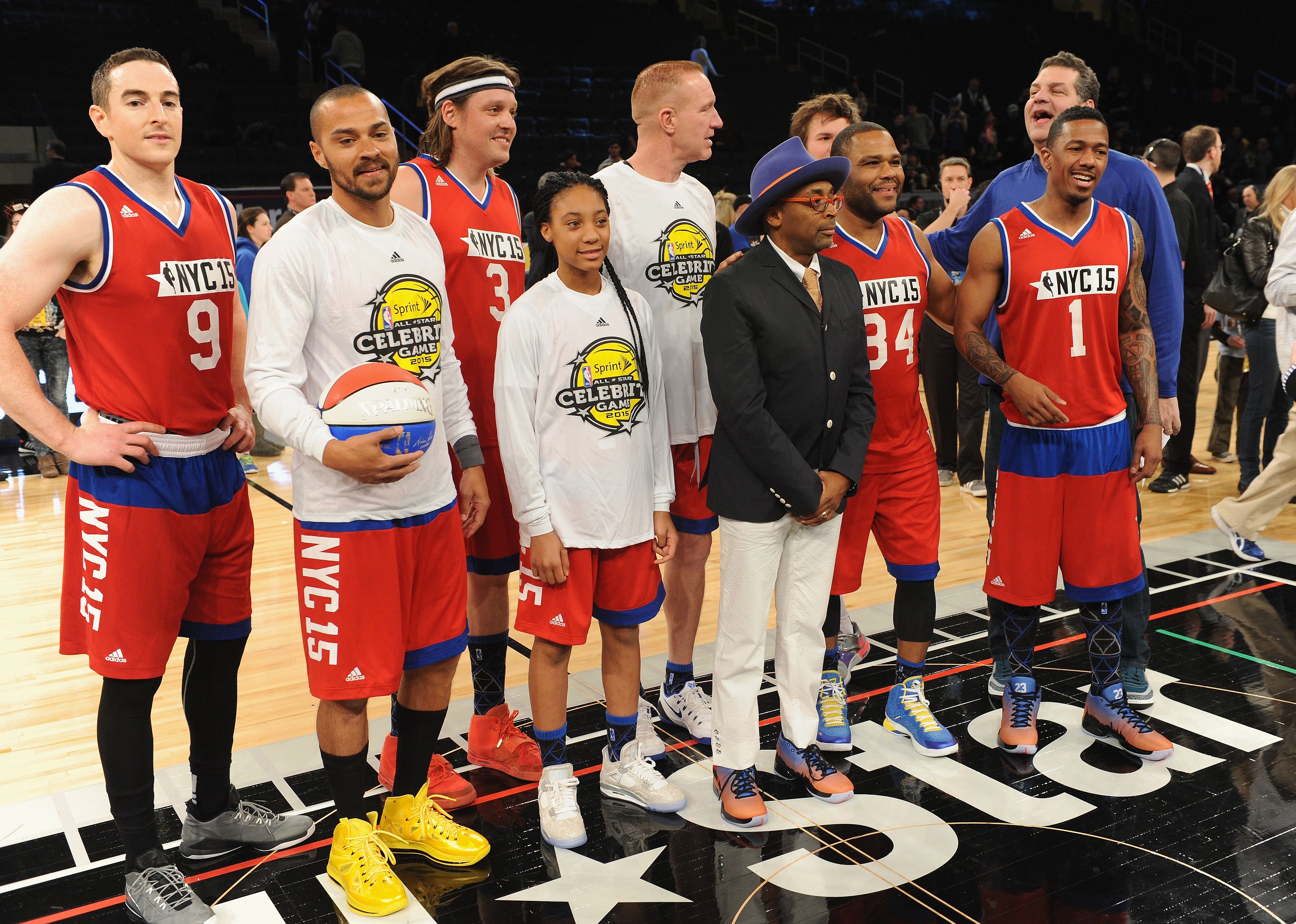 Robert Pera, Jesse Williams, Win Butler, Mo'Ne Davis, Spike Lee, Anthony Anderson, Mike Golic and Nick Cannon attend the NBA All-Star Celebrity Game in red basketball uniforms.