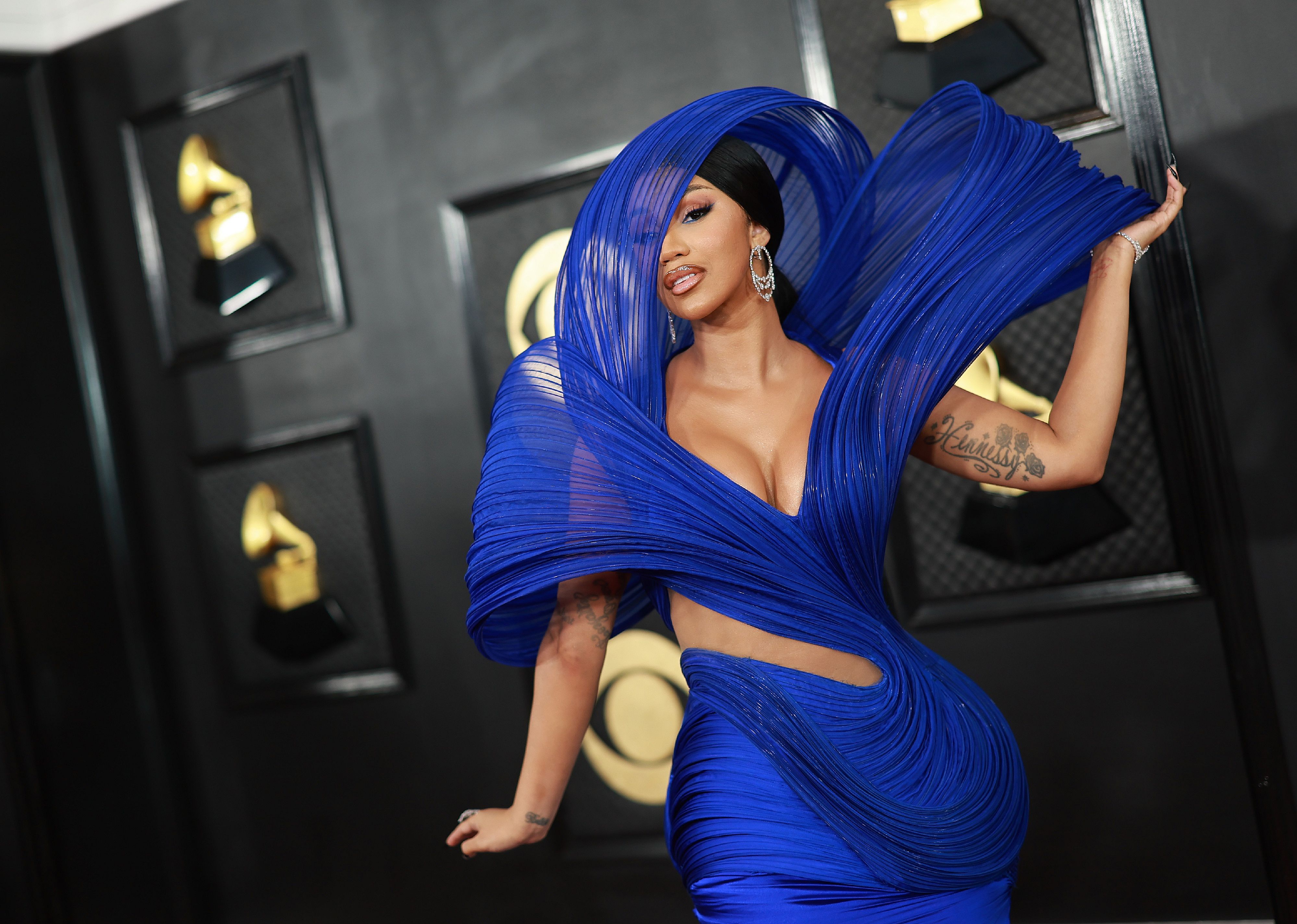 Cardi B in a blue avant garde gown.