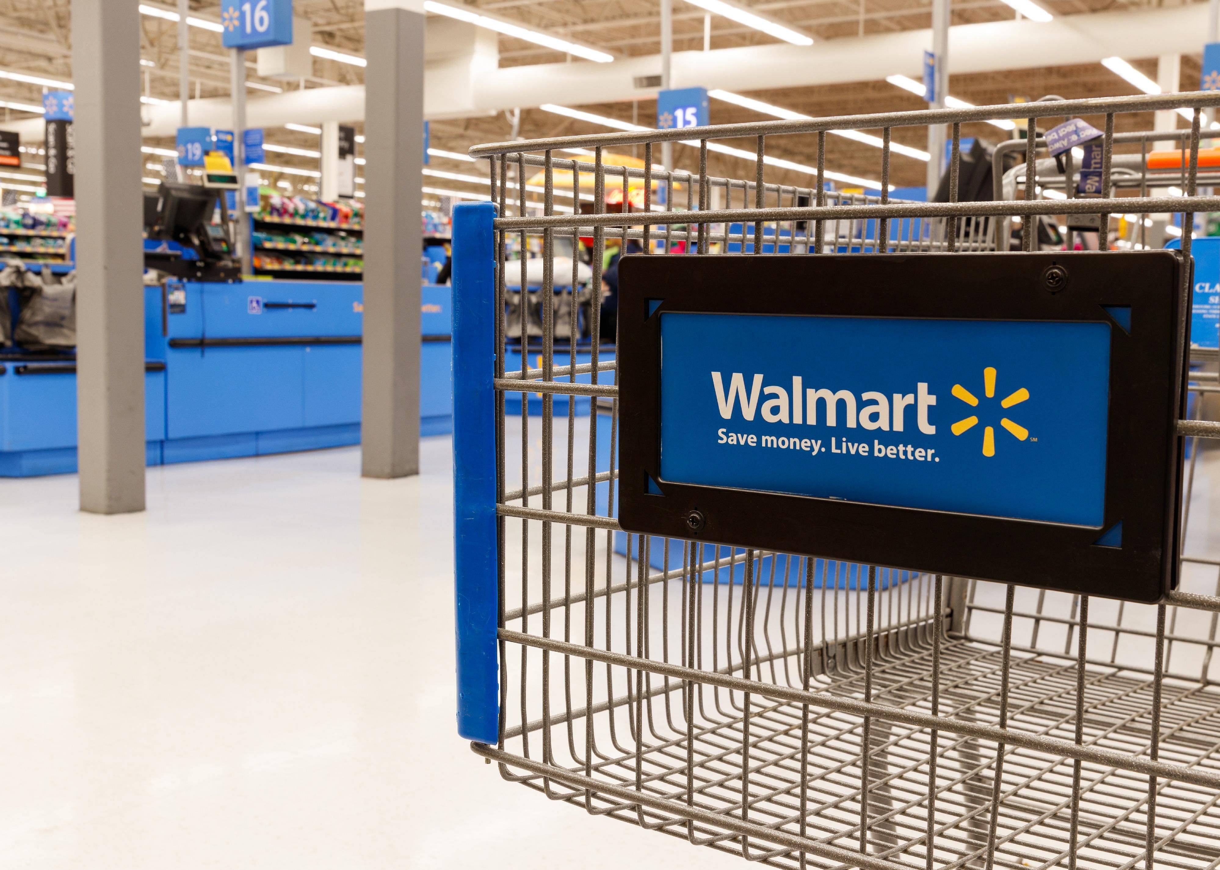 A shopping cart in a Walmart store.