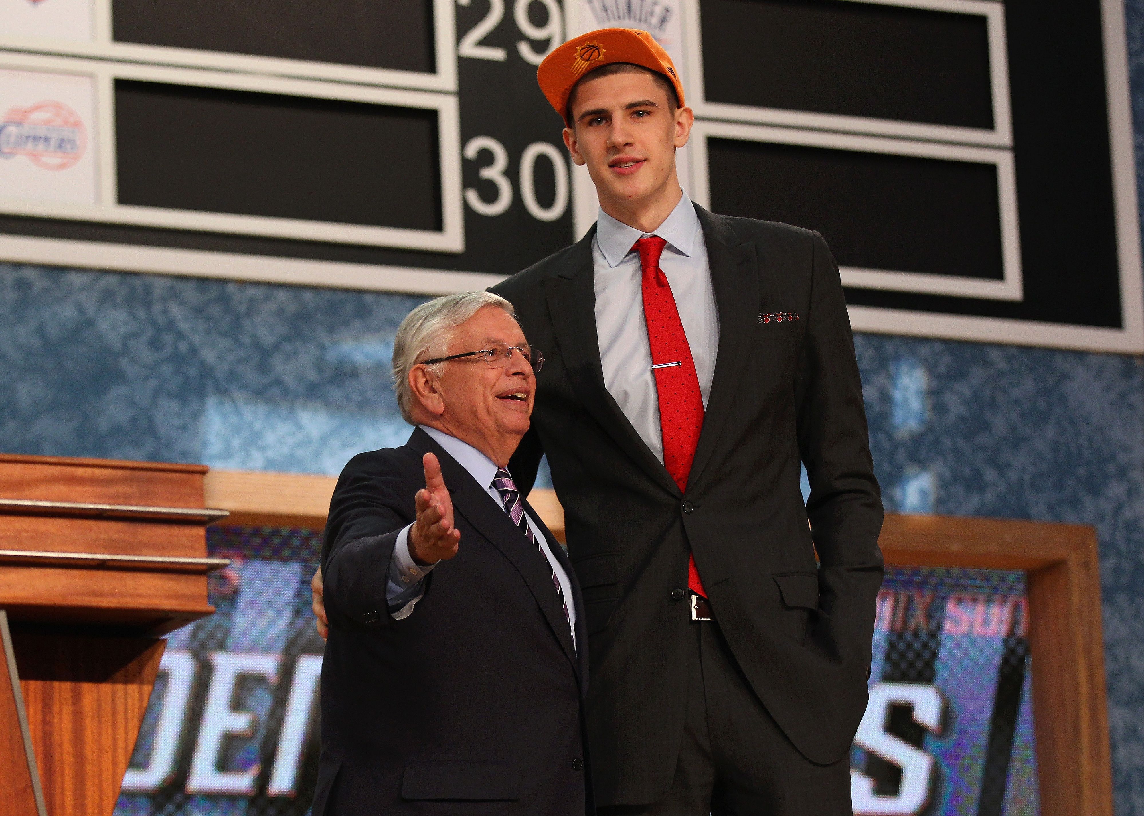 Alex Len with NBA Commissioner David Stern after he was was drafted. 