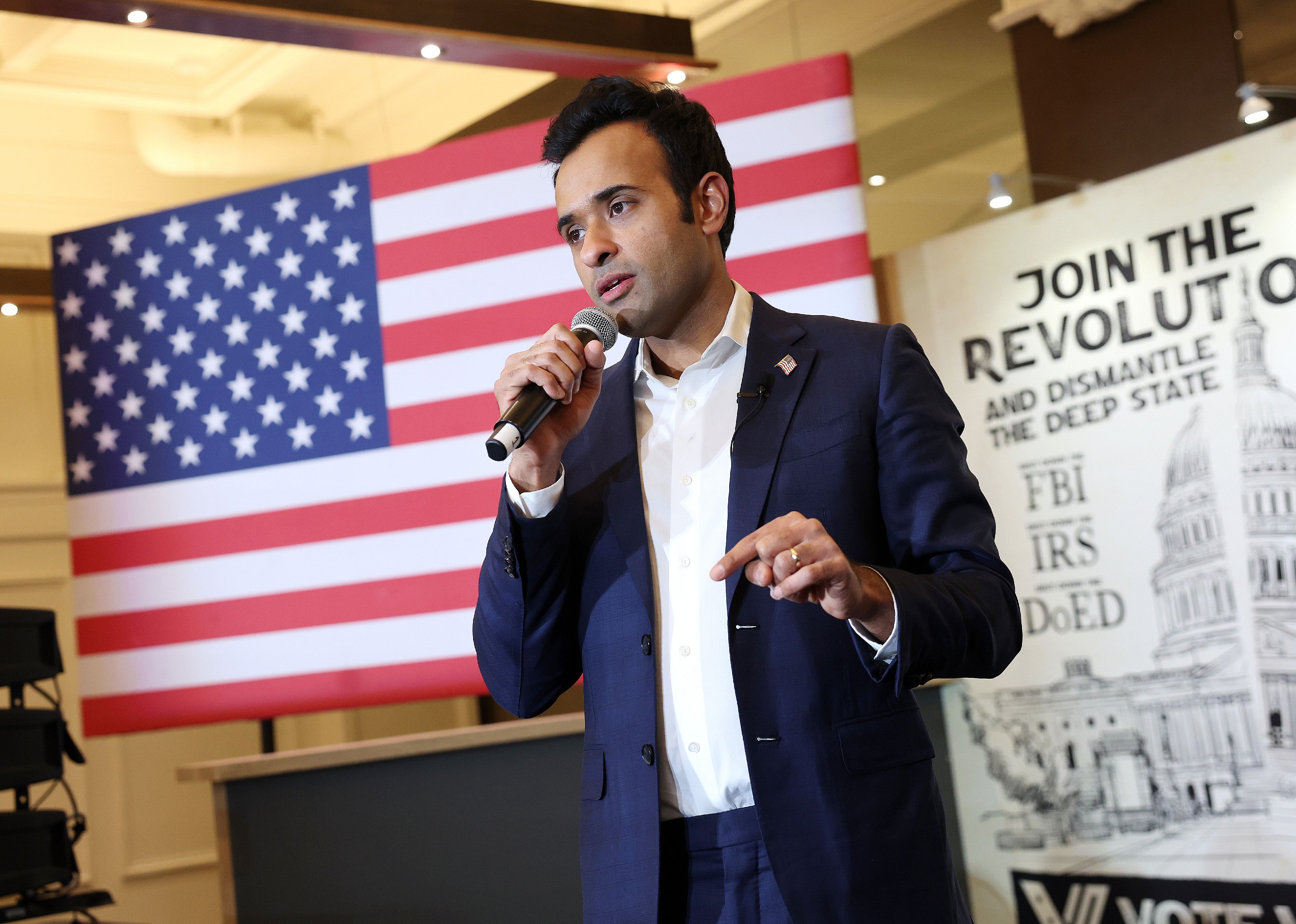 Vivek Ramaswamy speaks at his caucus night event. 