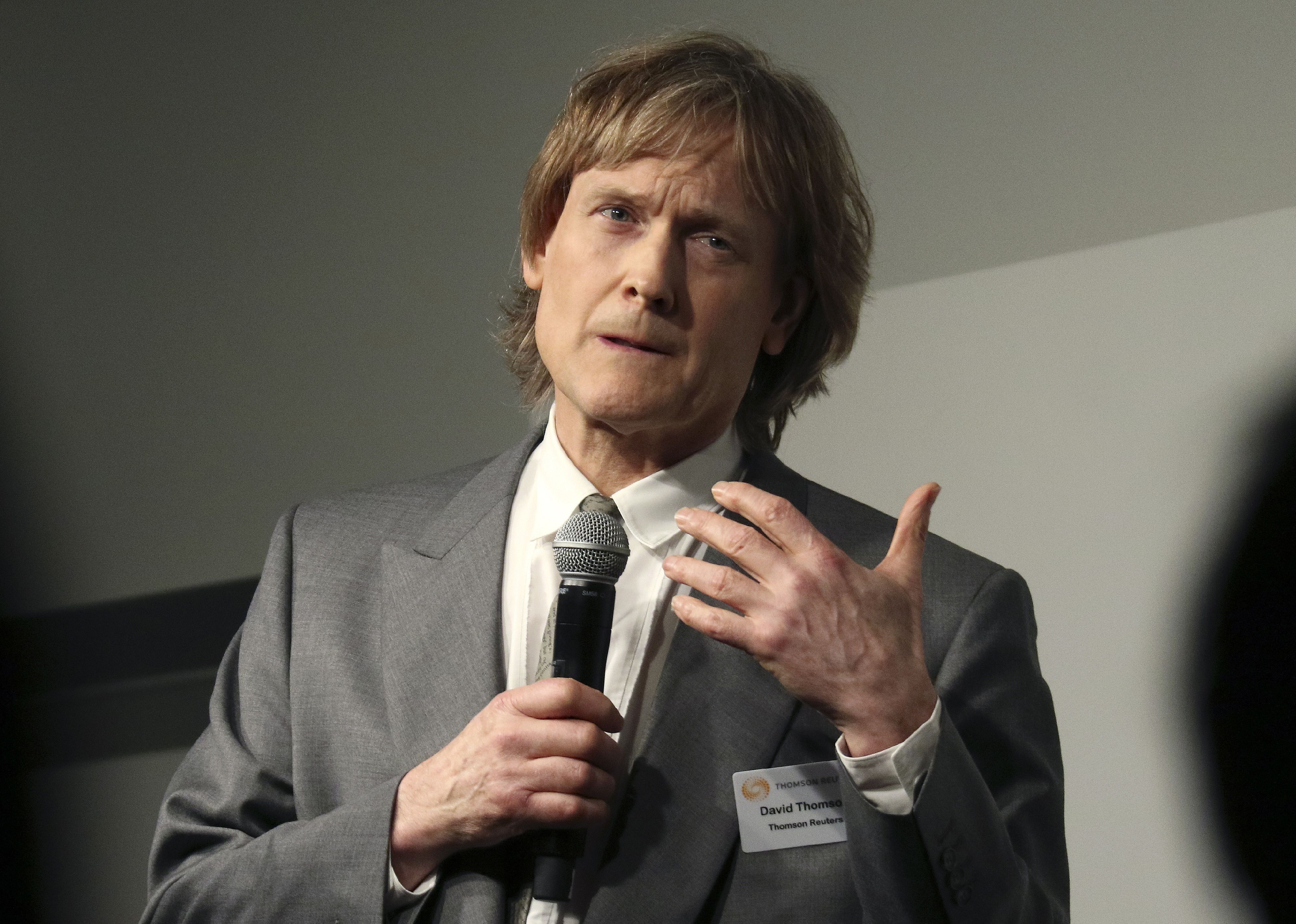 David Thomson speaks during a photography seminar.