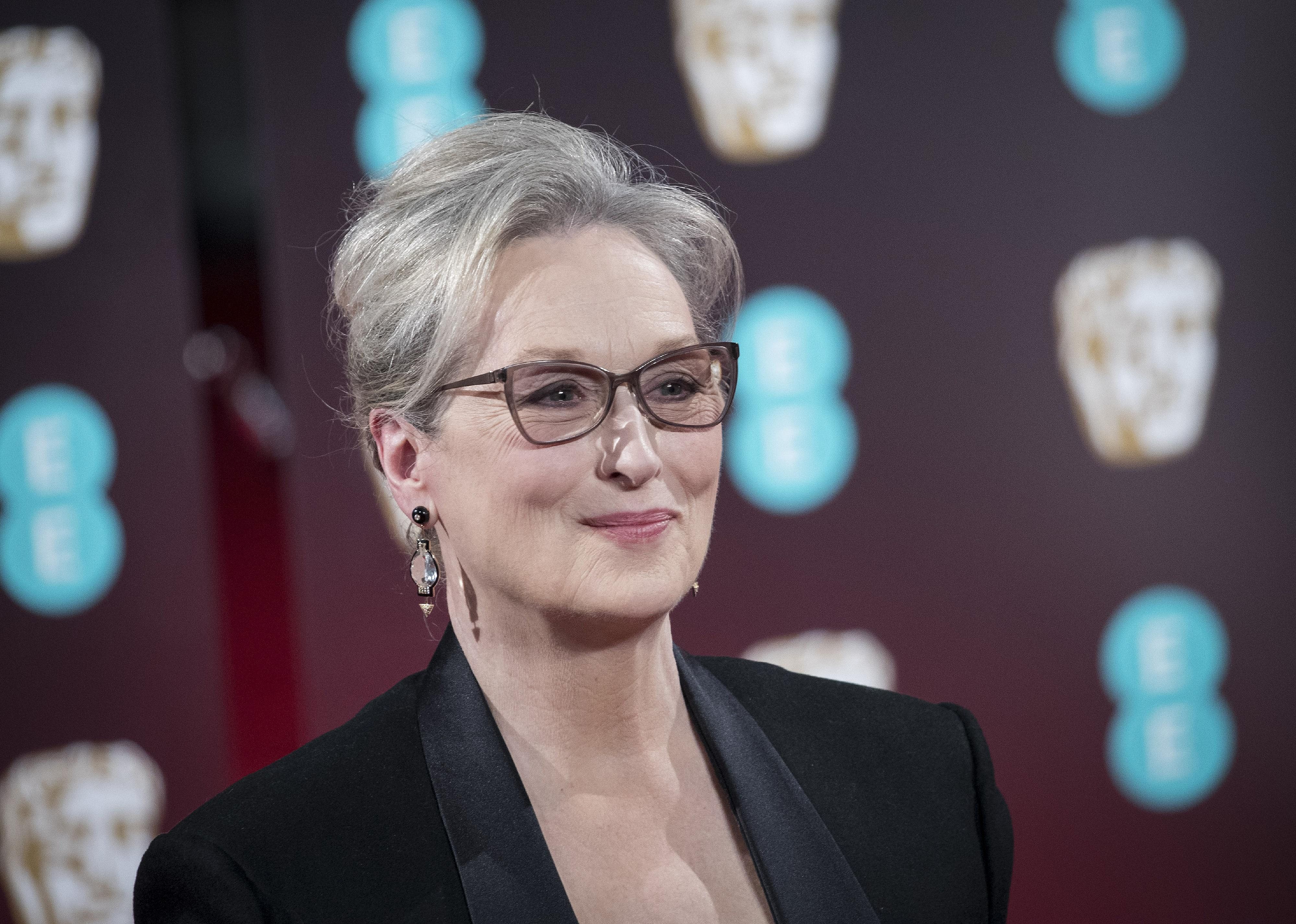 Meryl Streep smiling at an event. 
