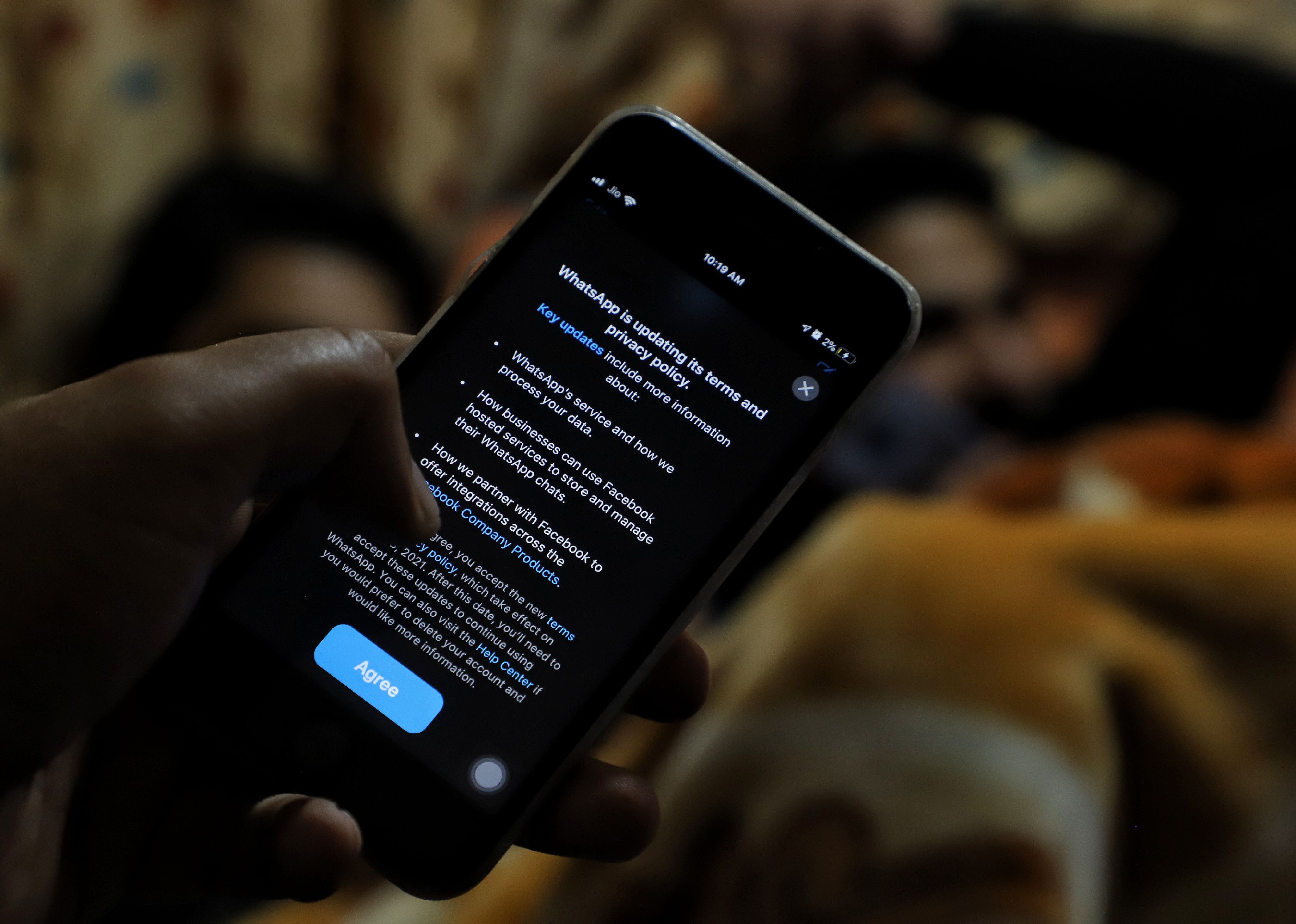 A dark phone with a privacy policy agreement pulled up.