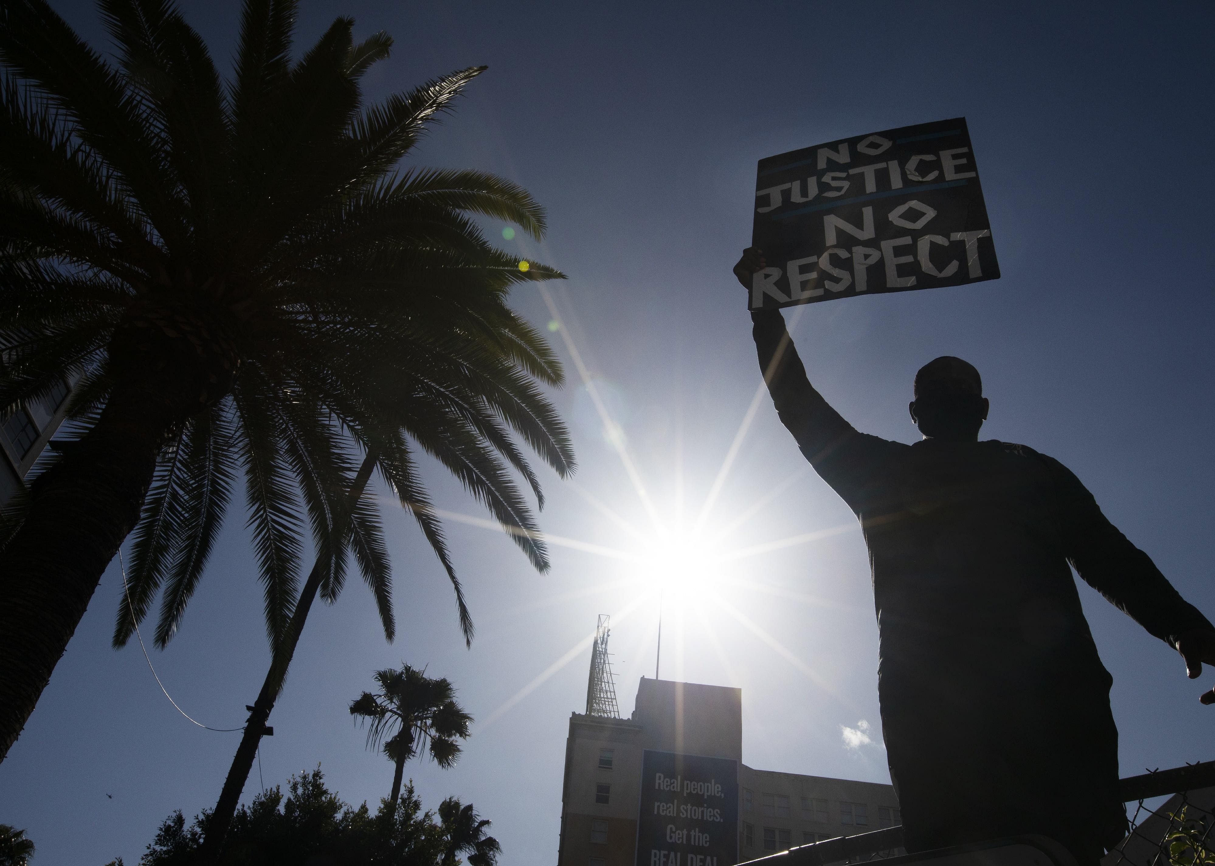 June 3: Los Angeles city officials cut over $100 million from LAPD budget