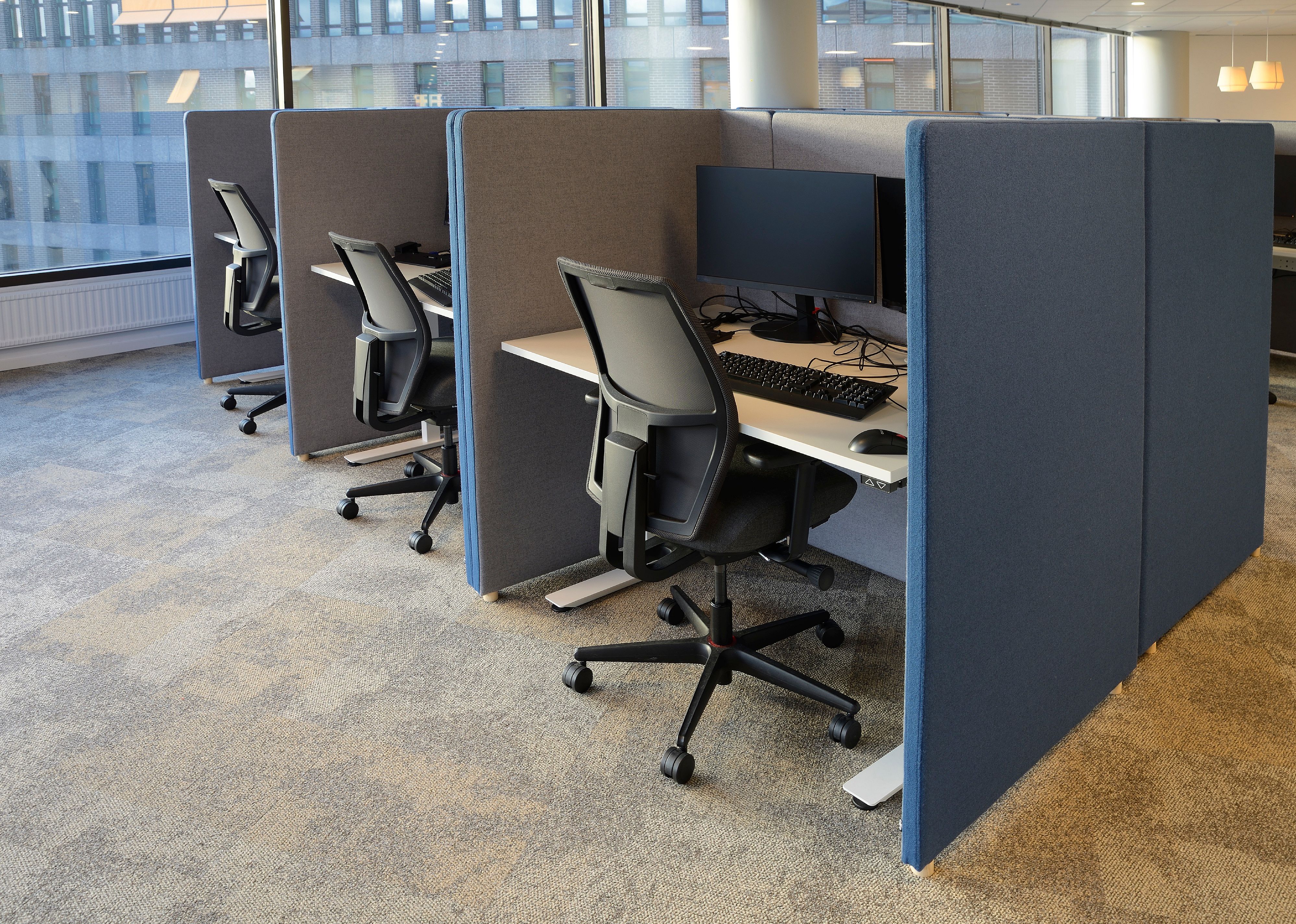 Empty office chairs in a row.