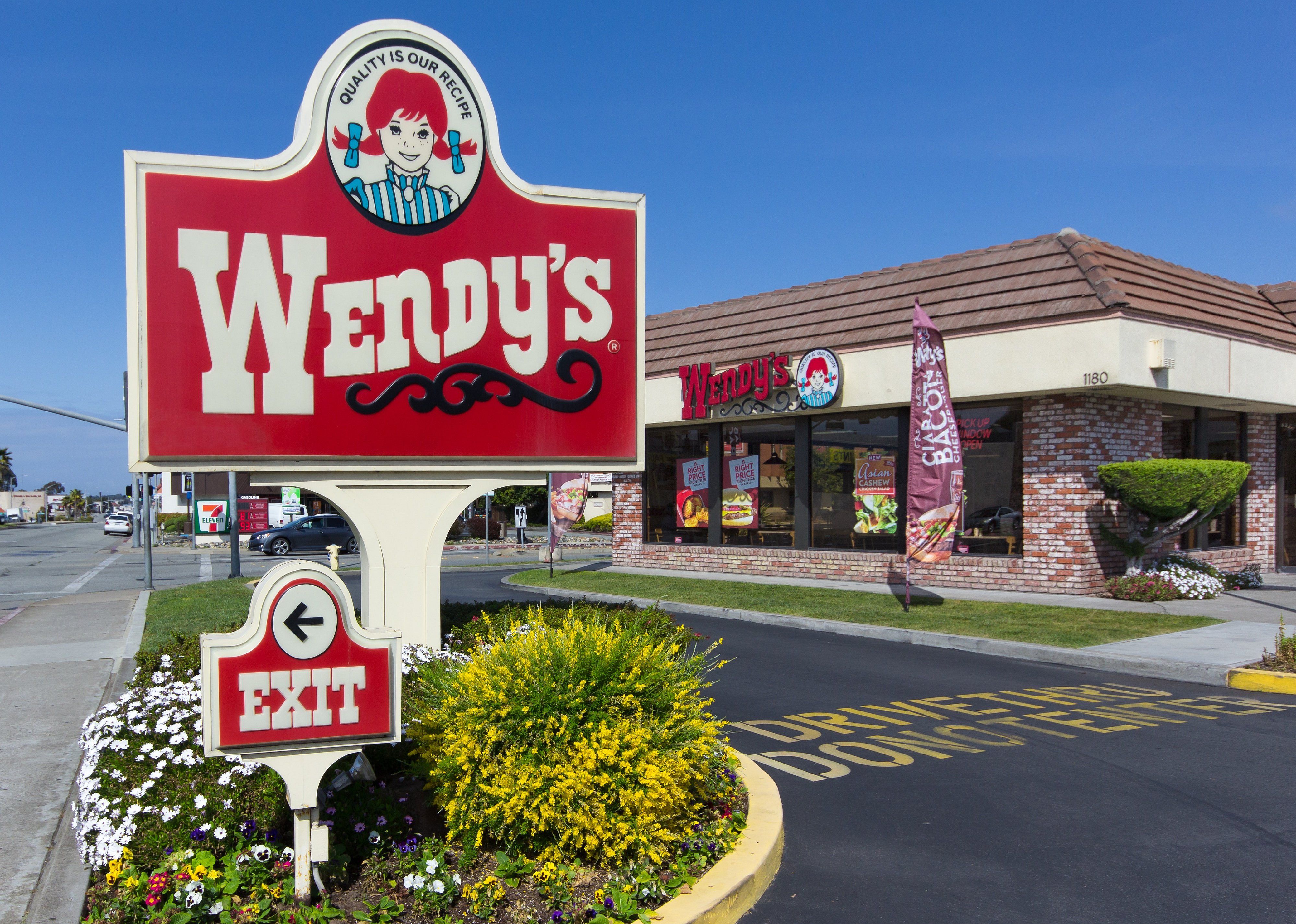 The Wendy's sign outside a Wendy's restaurant.