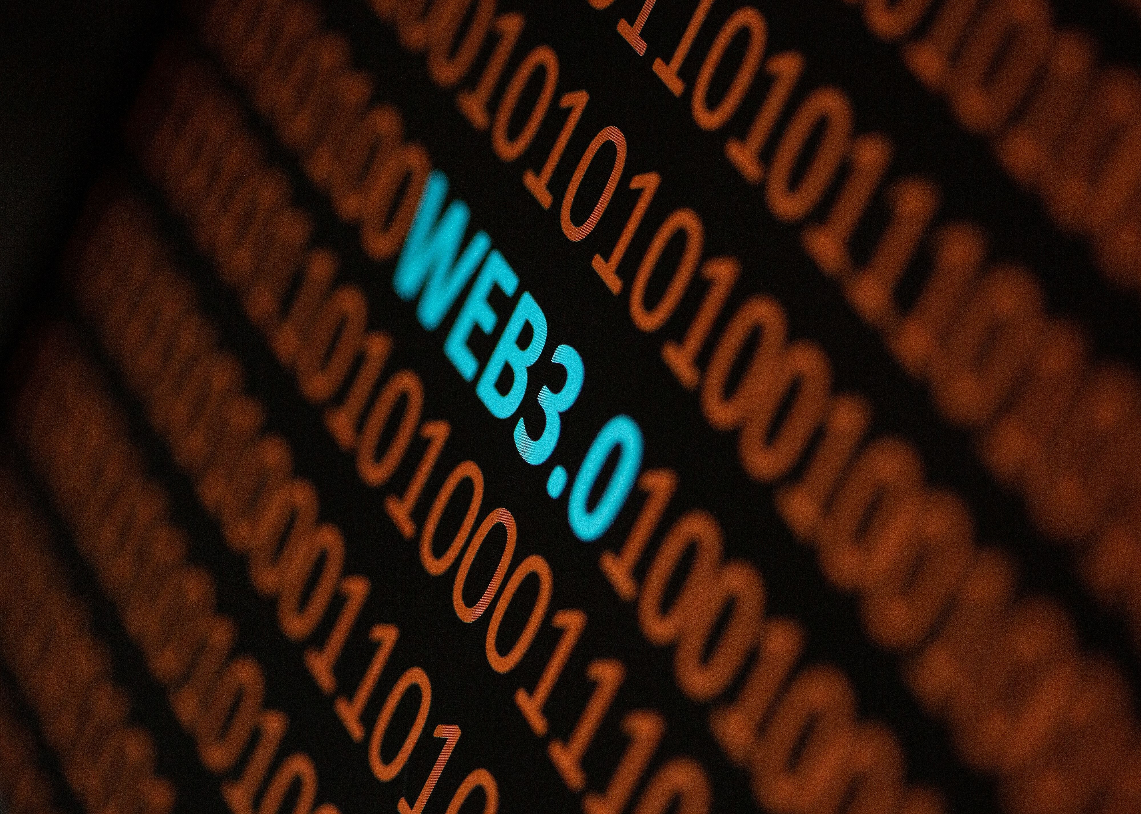 Close up of Binary codes on screen and WEB3.0 word in the middle.
