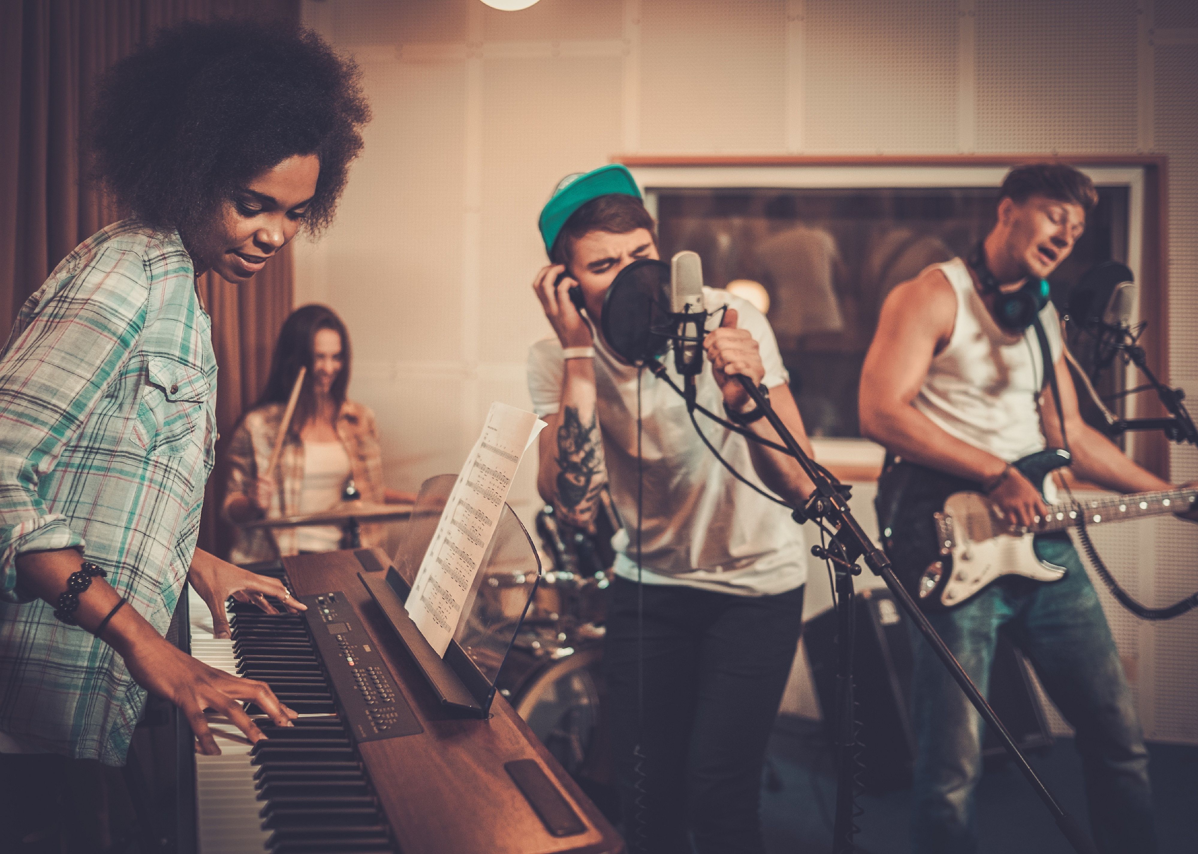Band performing in a recording studio