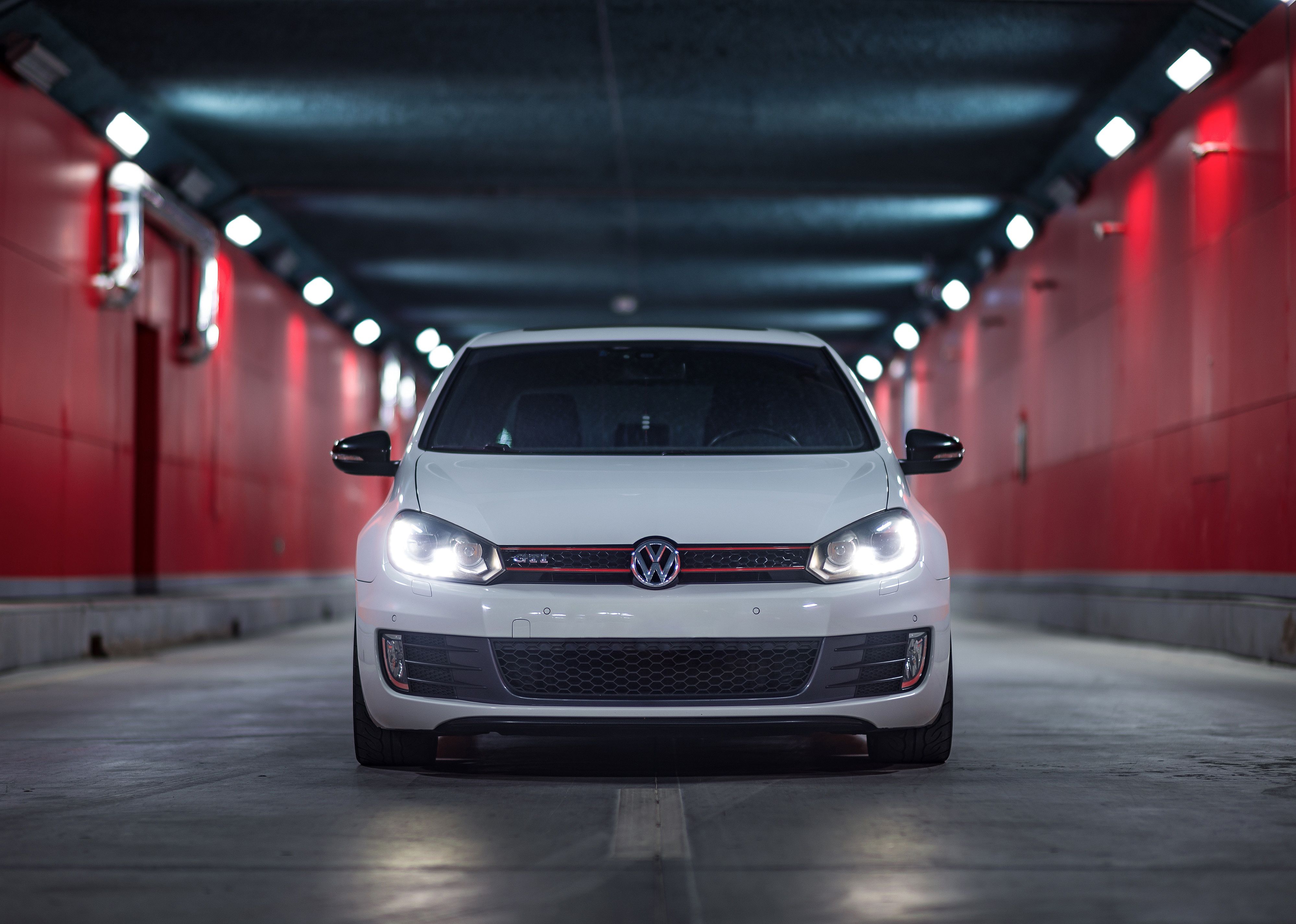 Volkswagen Golf GTI MK6 driving through a tunnel.