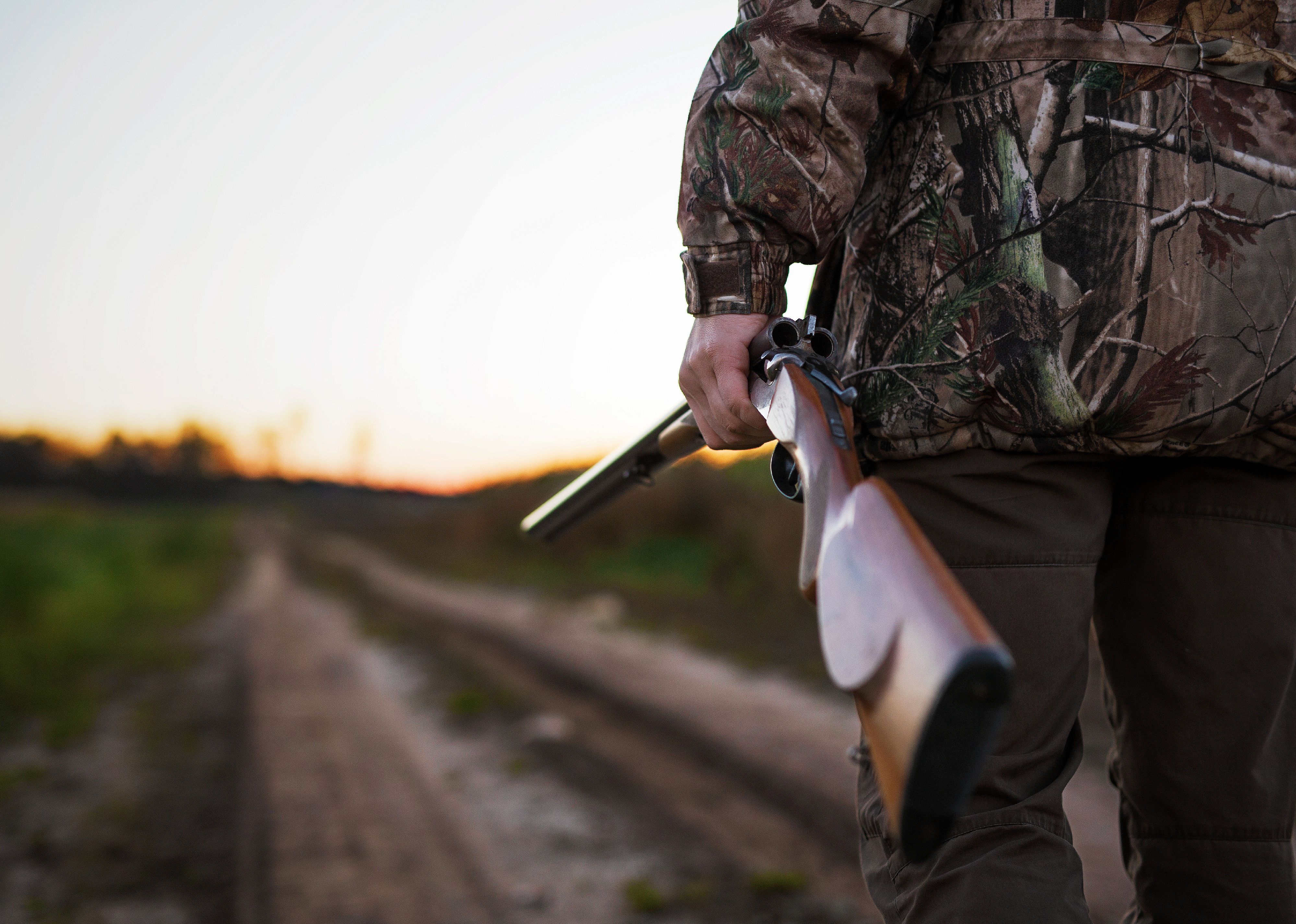 Hunter with rifle.