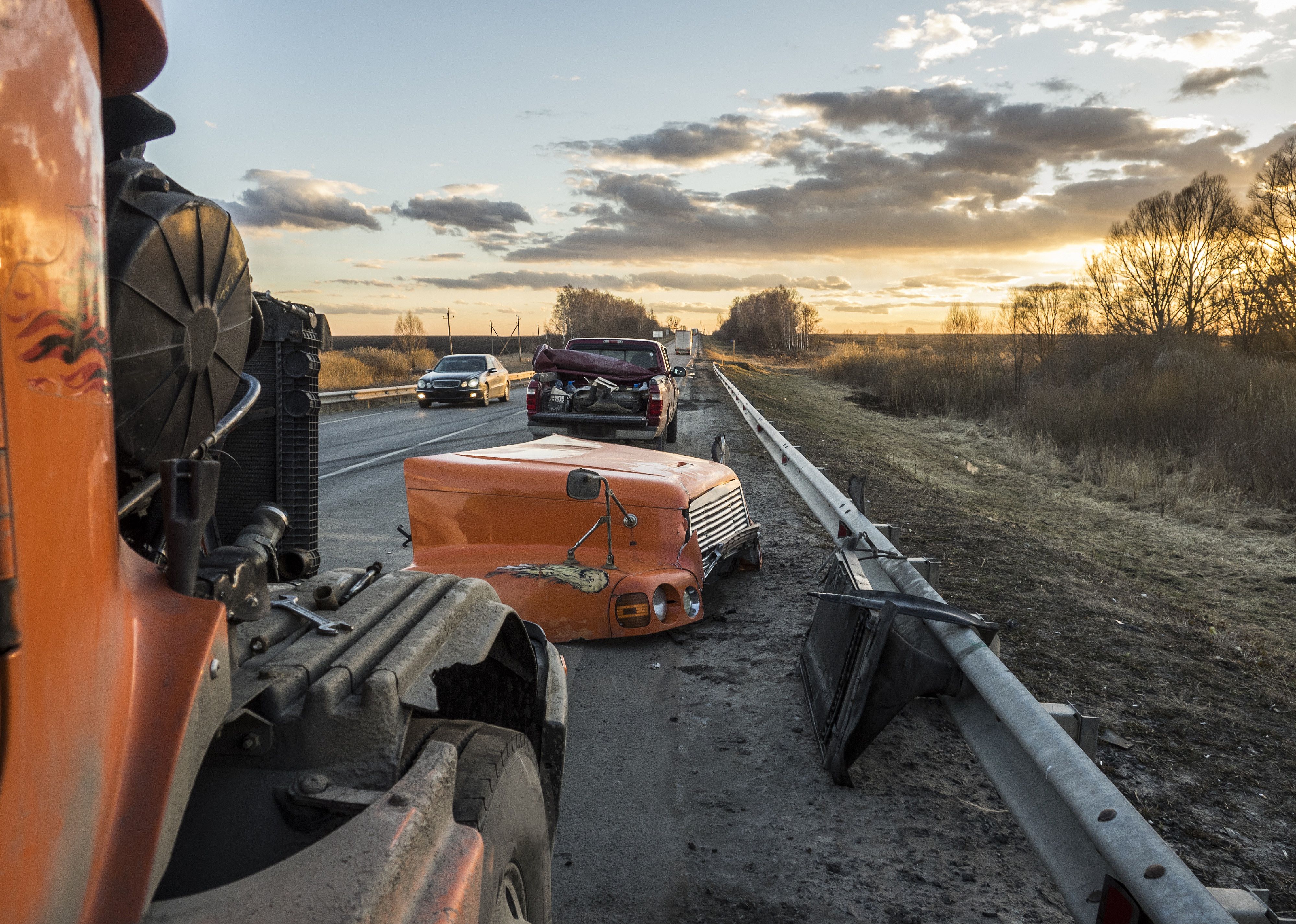 Large truck with broken bumper