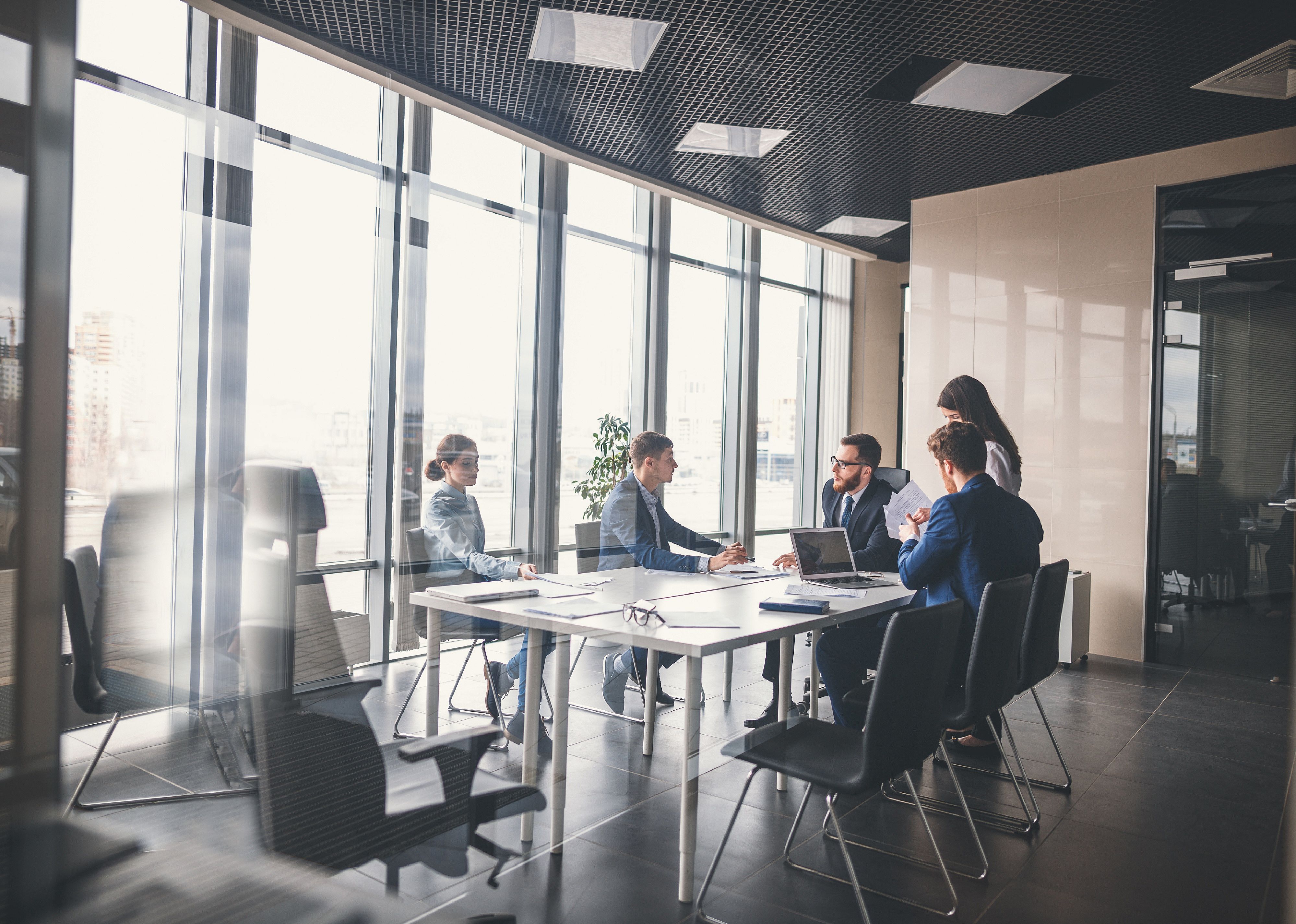 Corporate business team and manager in a meeting.