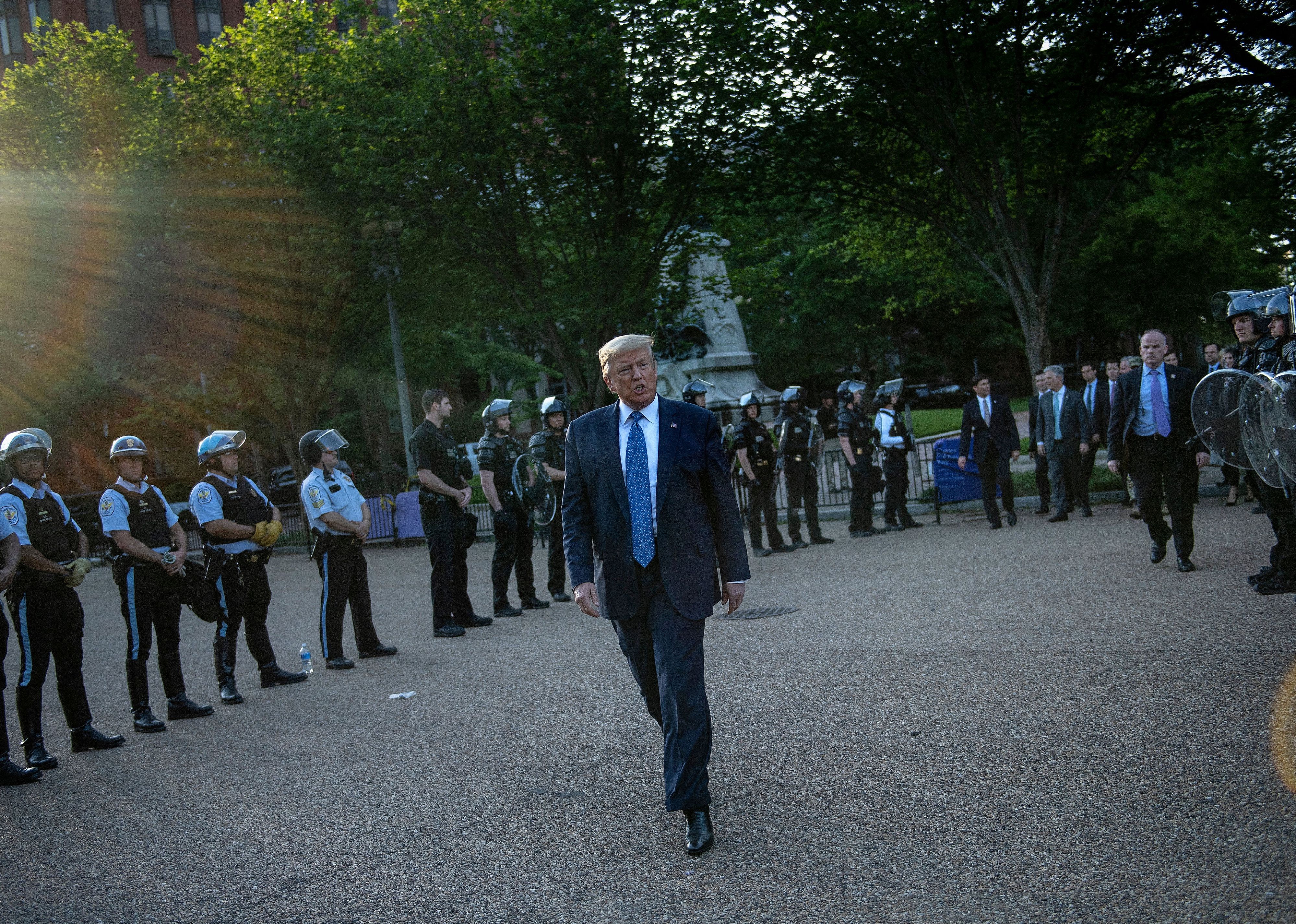 Clearing protesters for a photo op