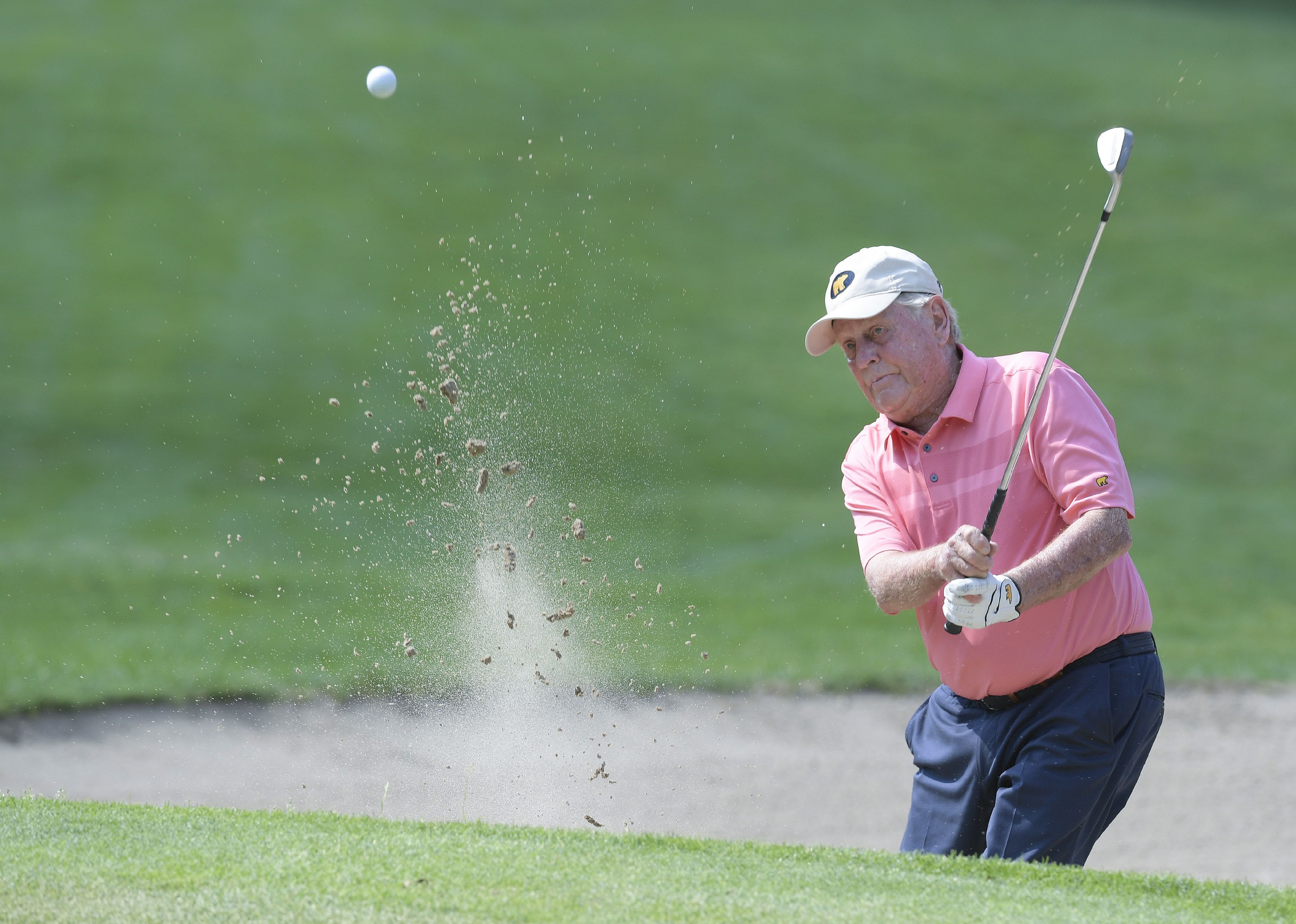 Jack Nicklaus hits a bunker shot