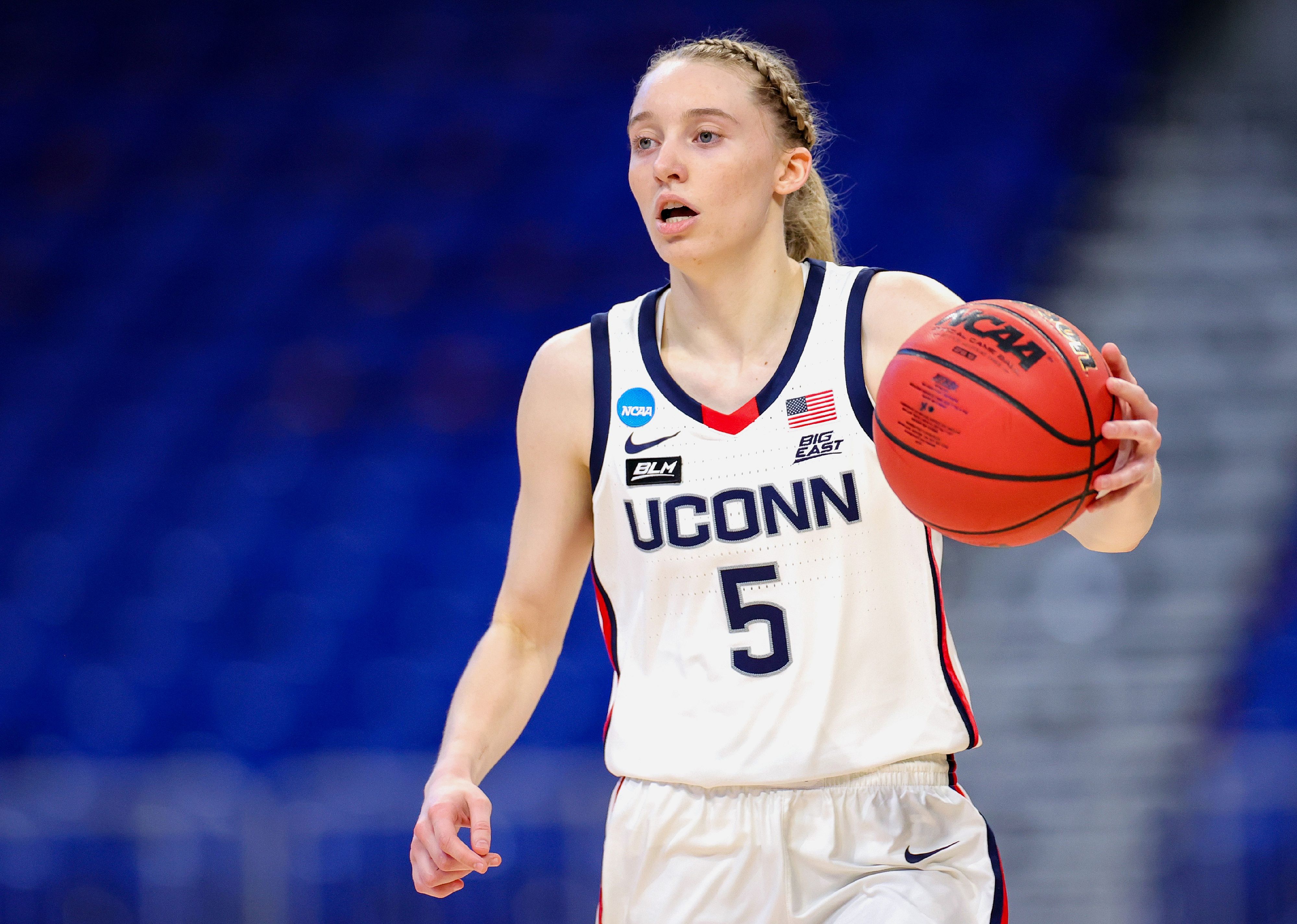 Paige Bueckers controls the ball during a game.