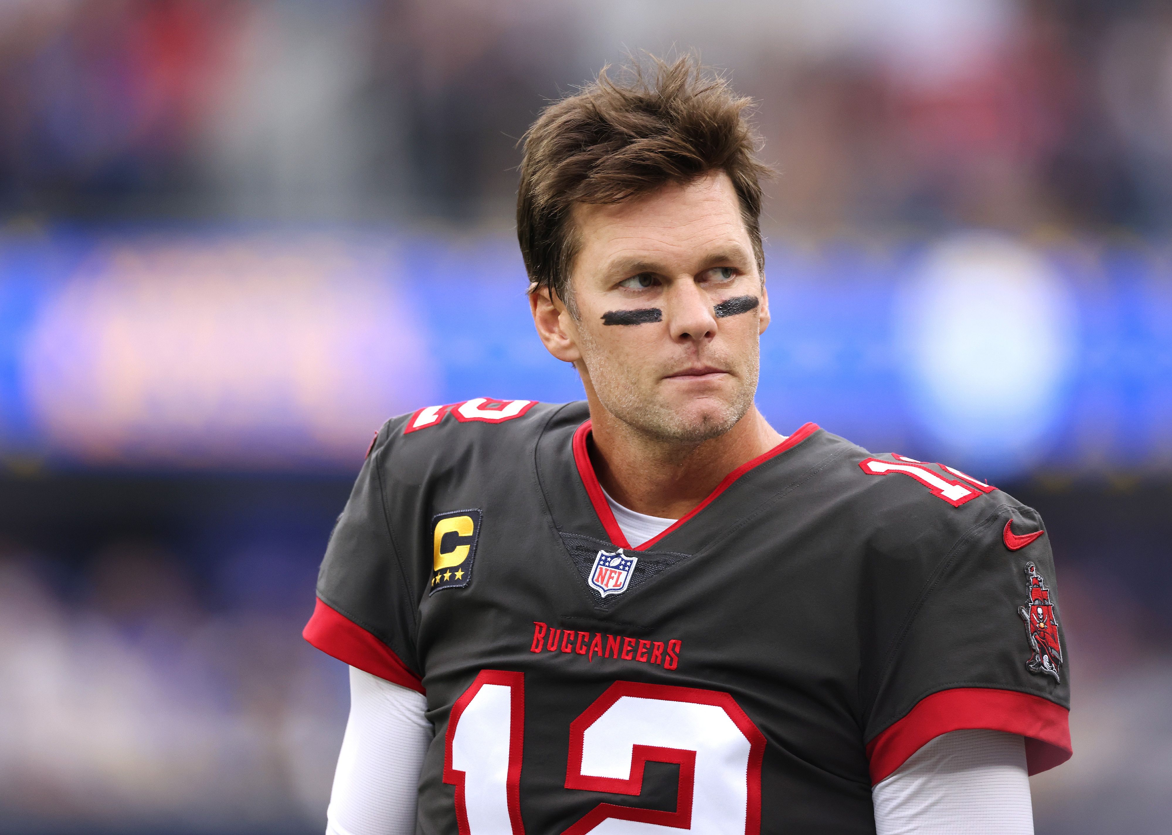 Tom Brady on the sideline during the first quarter of a game