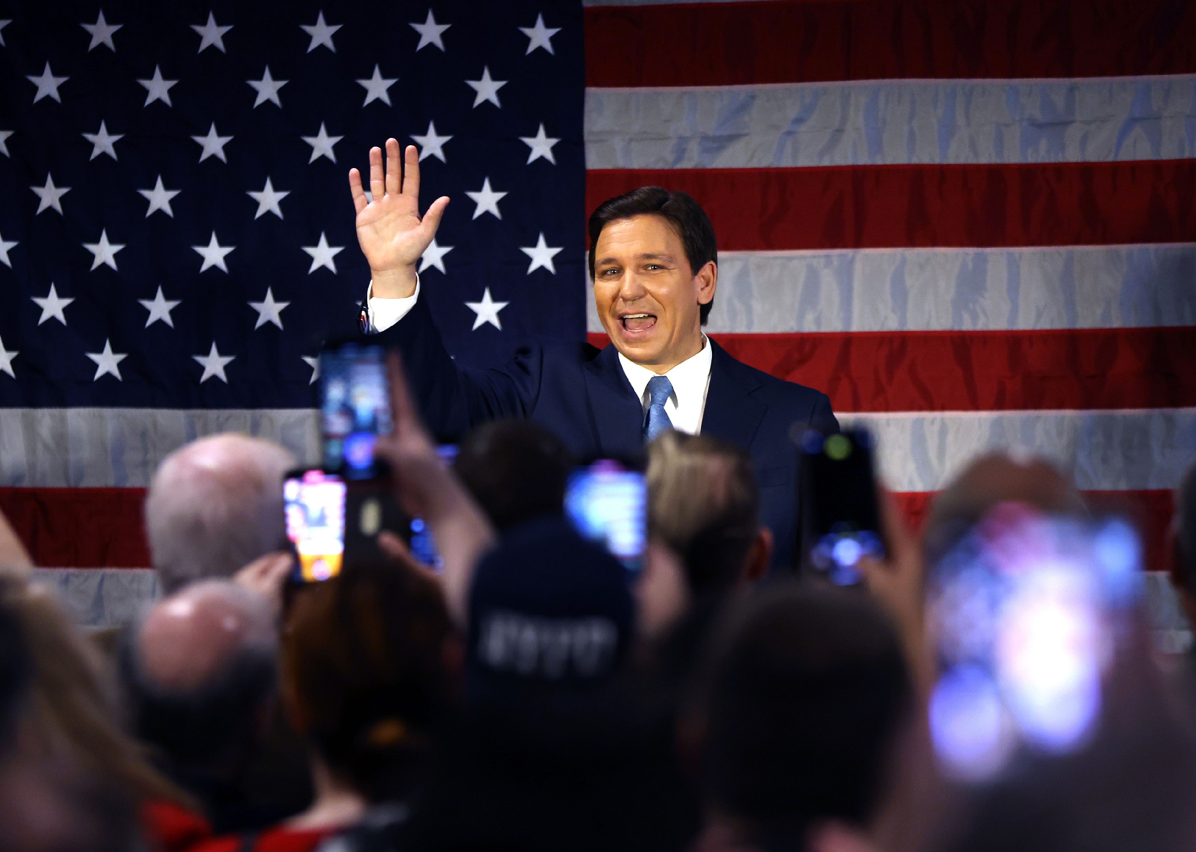 Ron DeSantis waves as he speaks to police officers about protecting law and order in the Staten Island.