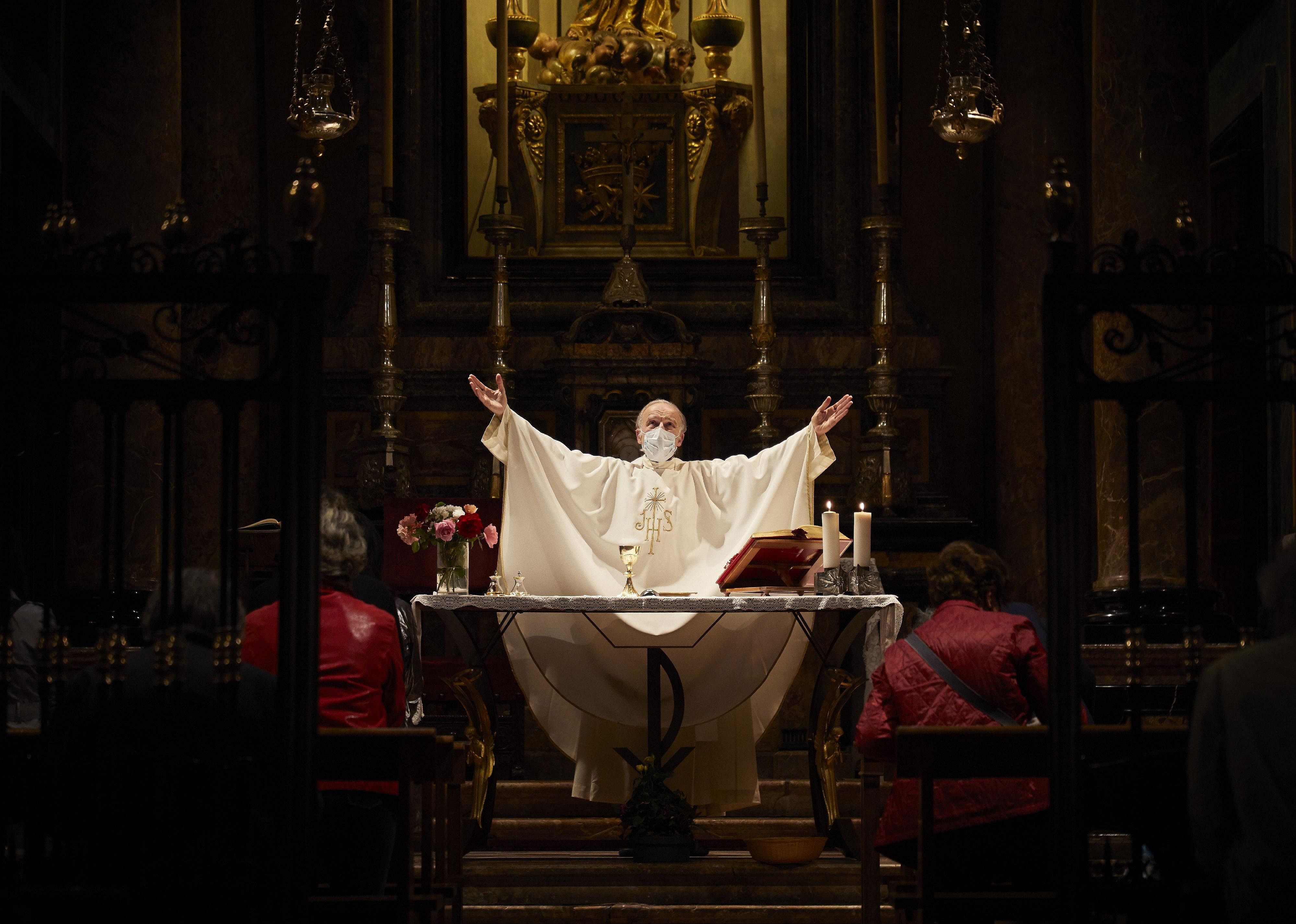 Celebrating mass from behind a mask in Milan