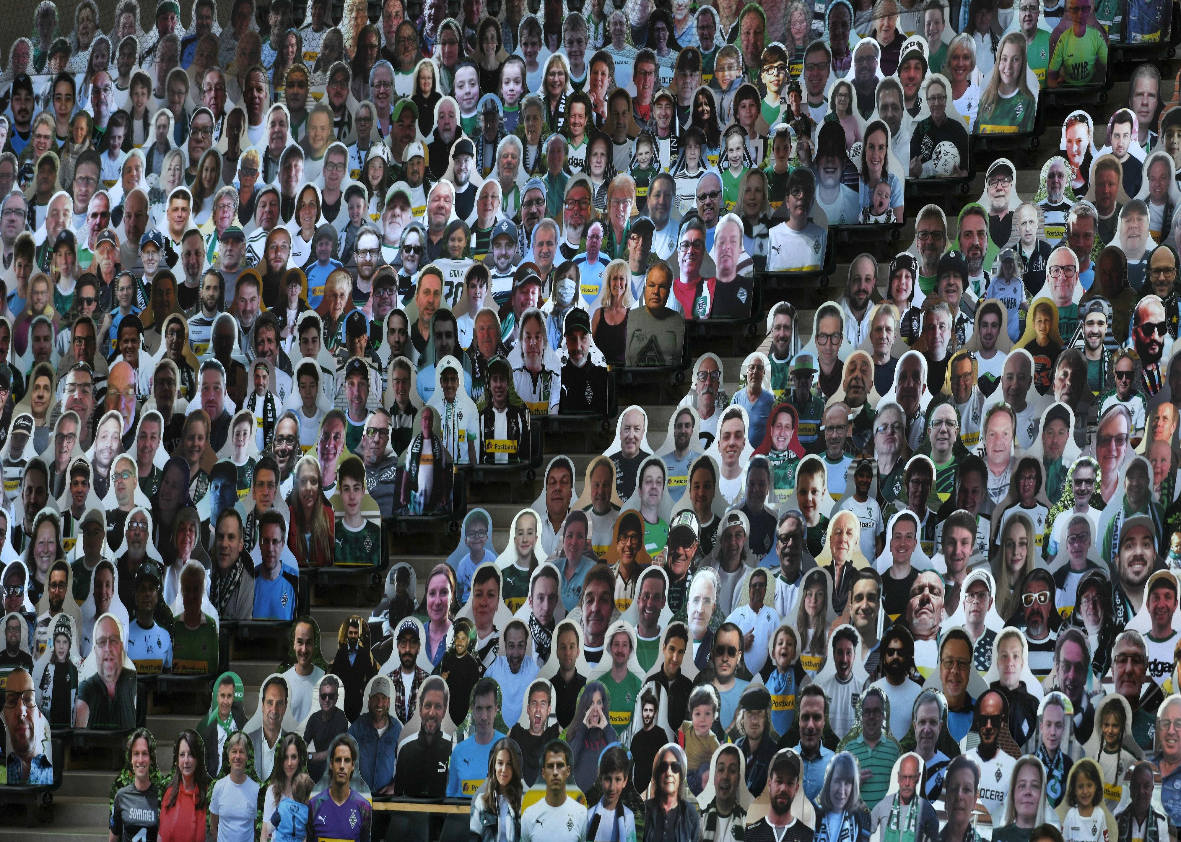 Cardboard crowds as German soccer supporters