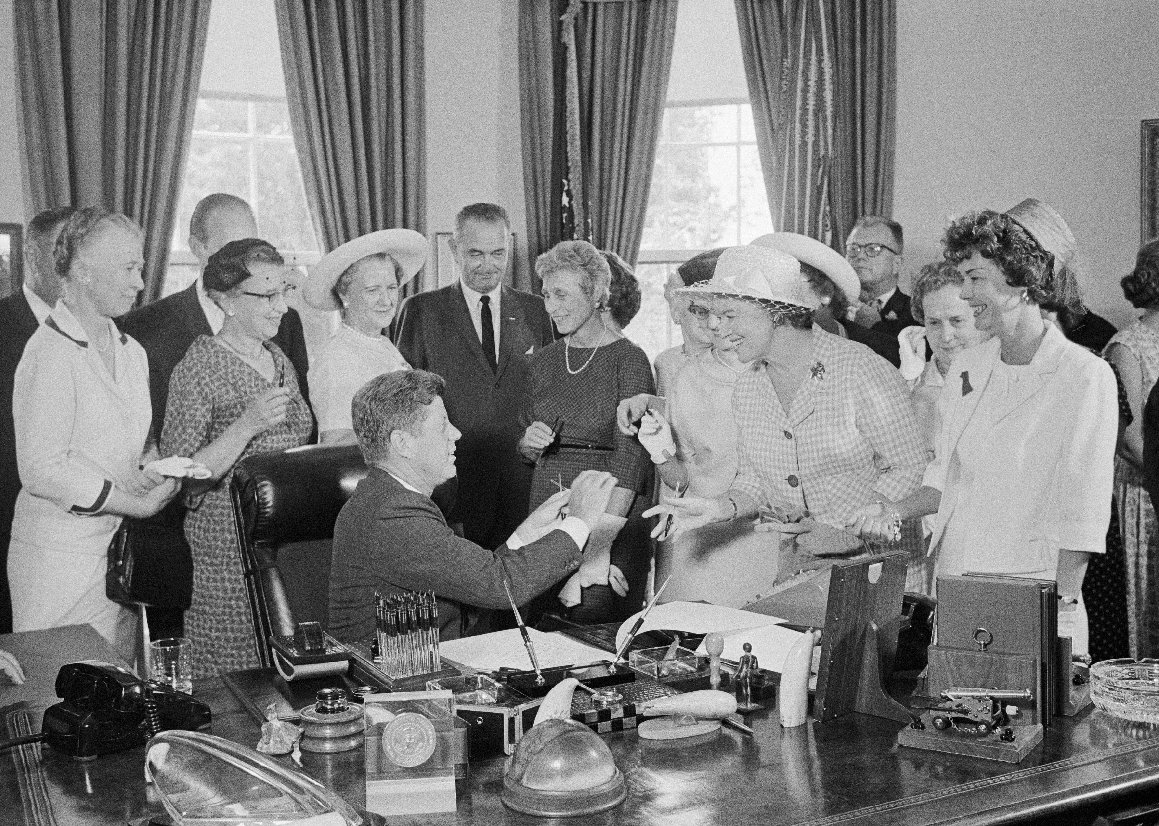 1963: Government requires businesses to pay women equally