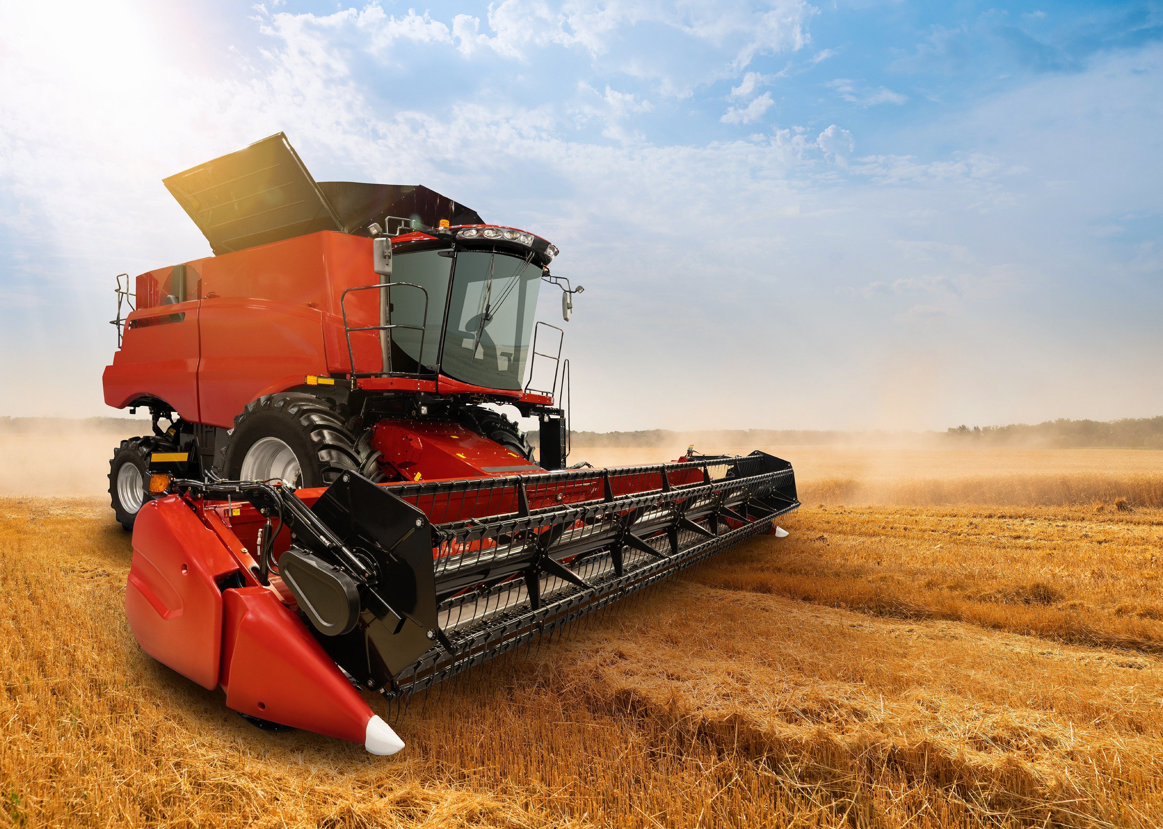 Combine harvester on a wheat field.