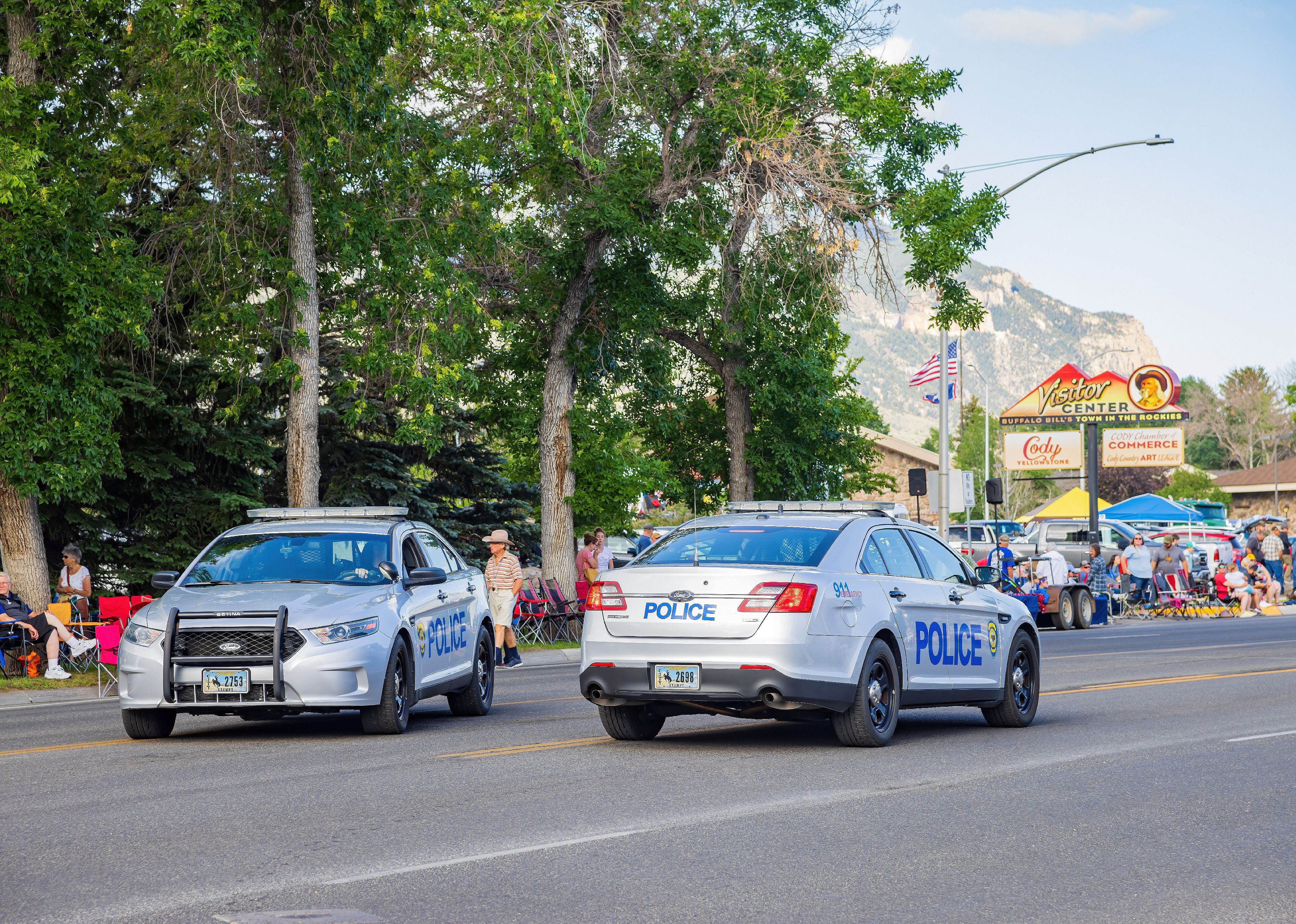 Wyoming police cars on the road.