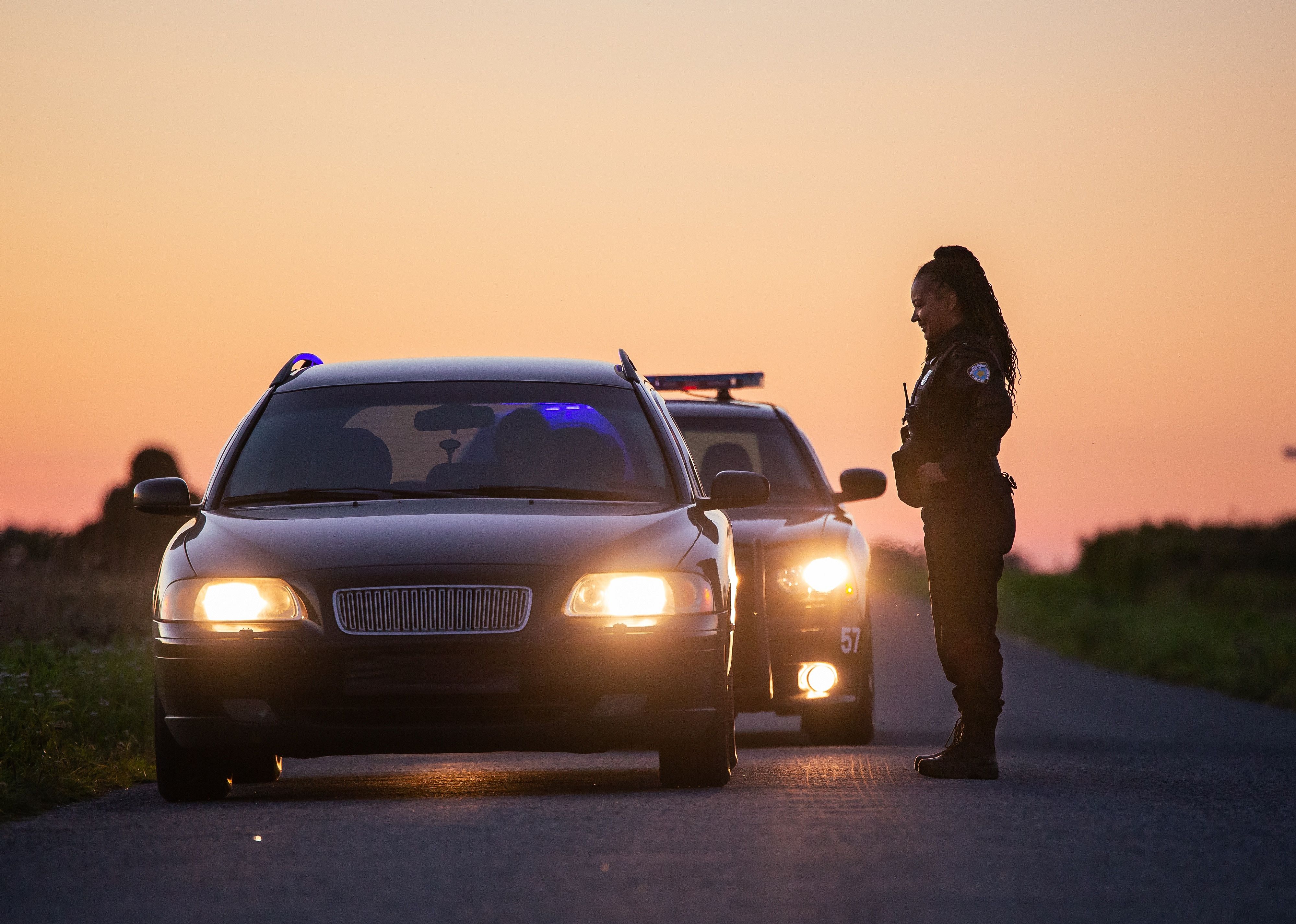 Traffic stop with car pulled over.