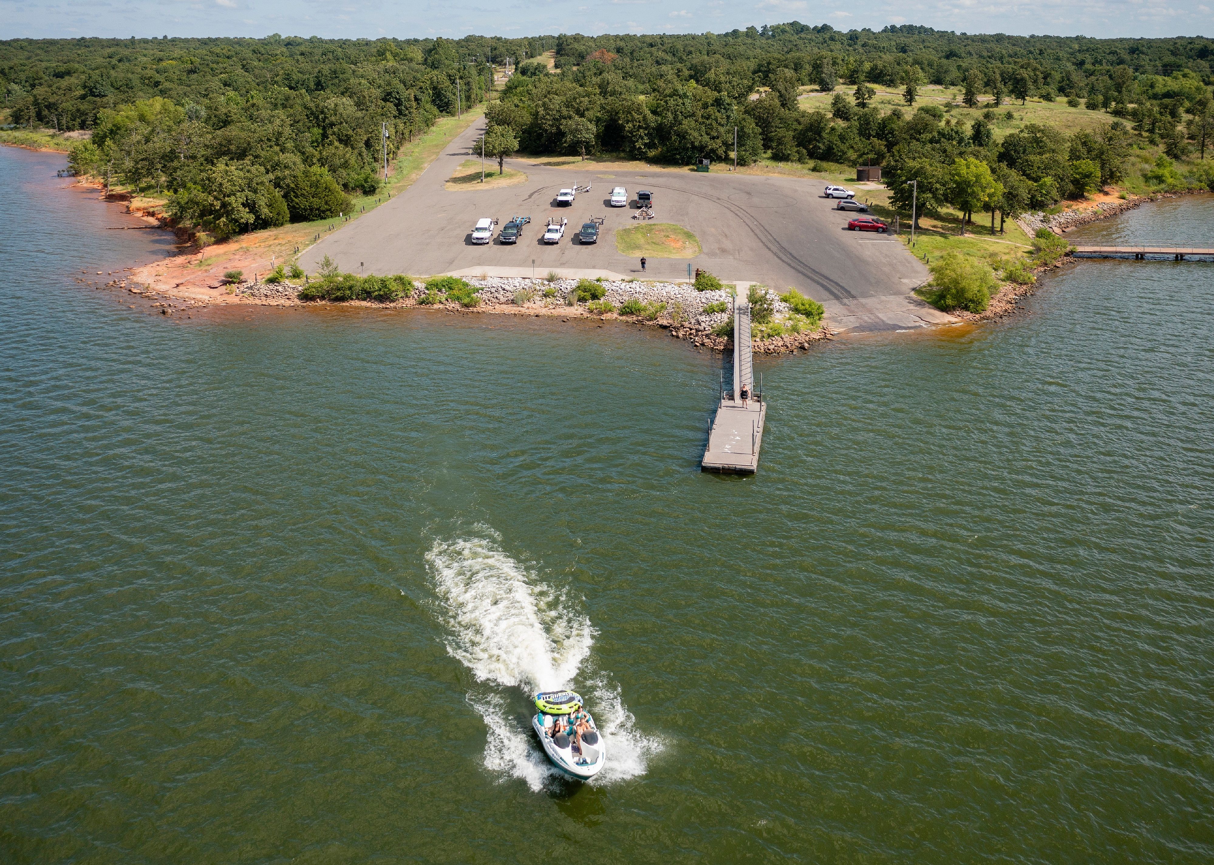 People on a boat on Lake Thunderbird.