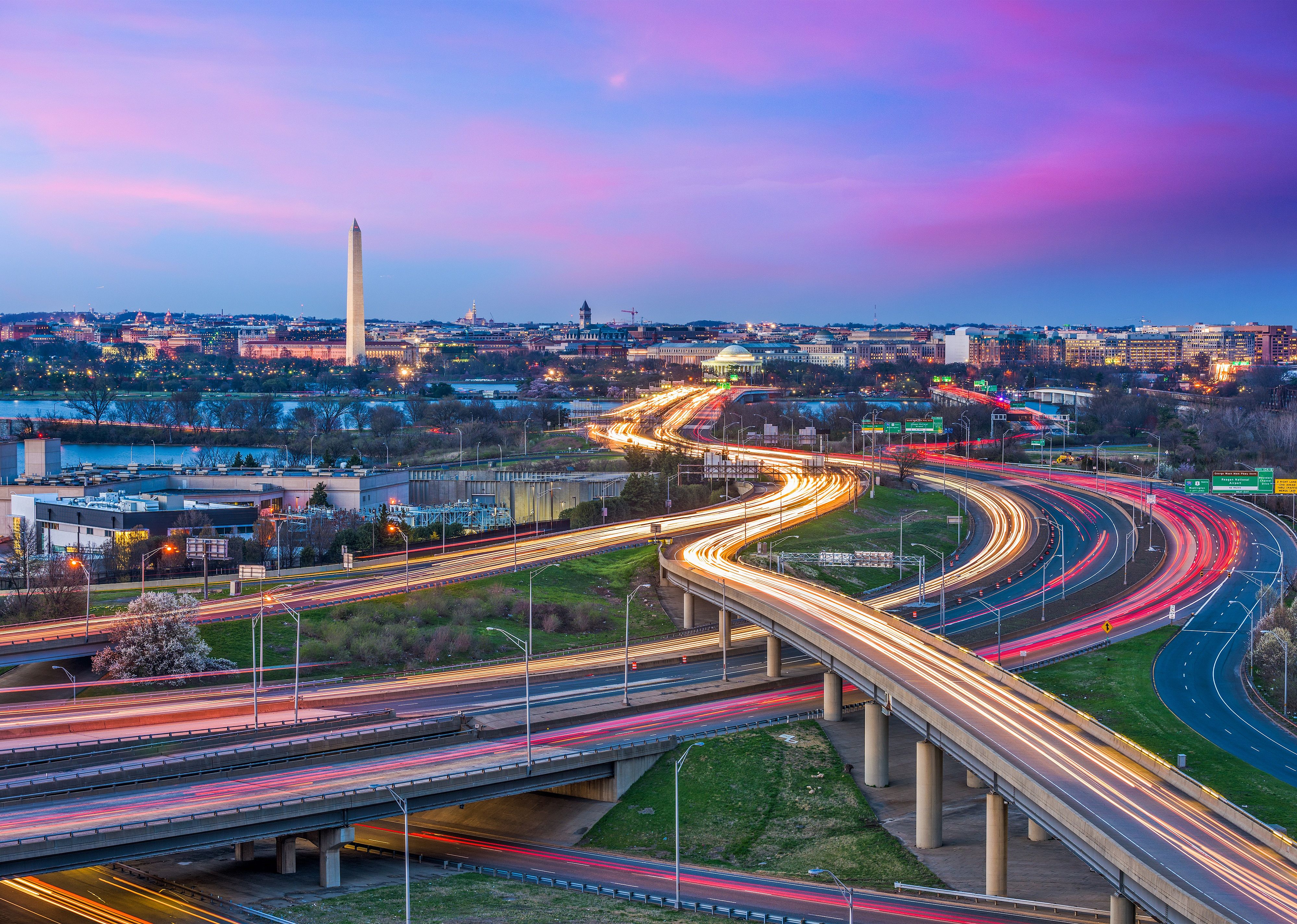 Washington D.C. skyline with highways and monuments.