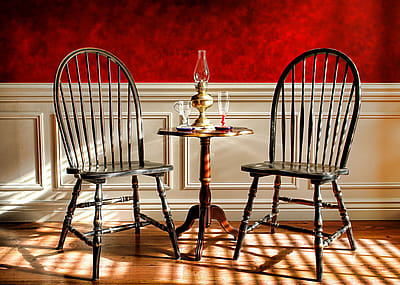 Windsor style chairs and mahogany table.